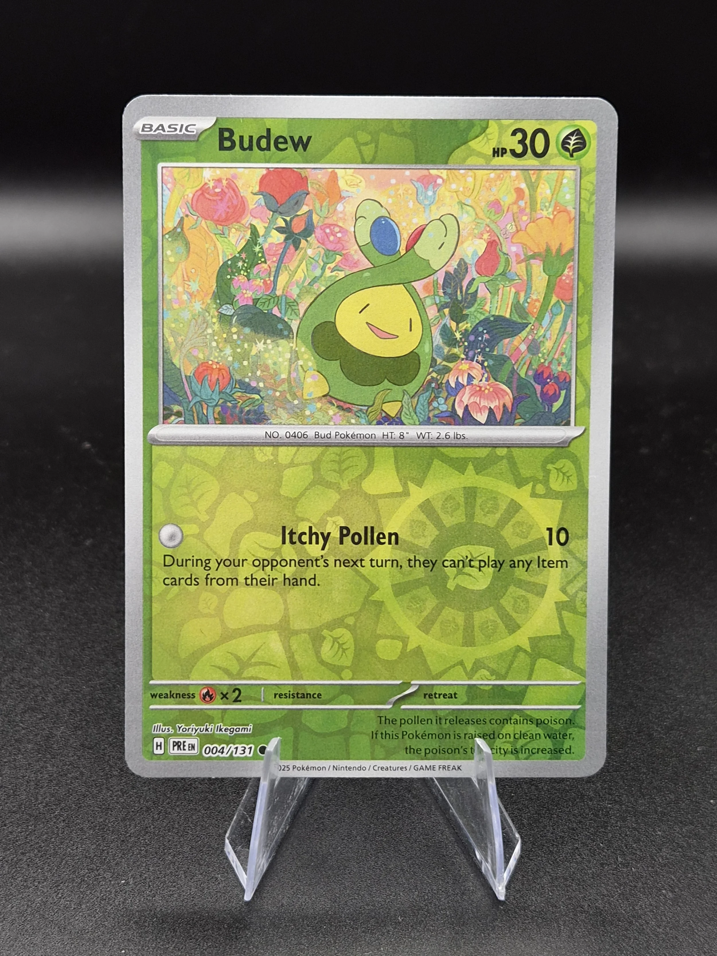 Budew 004/131 Prismatic Evolutions Reverse Holo Pokémon Card