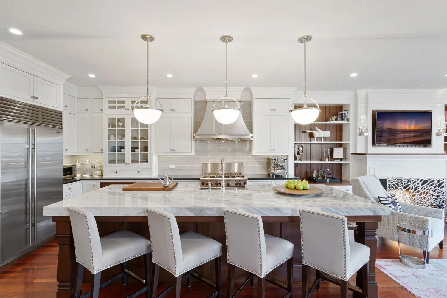 Kitchen island with seating for four, open to the family room