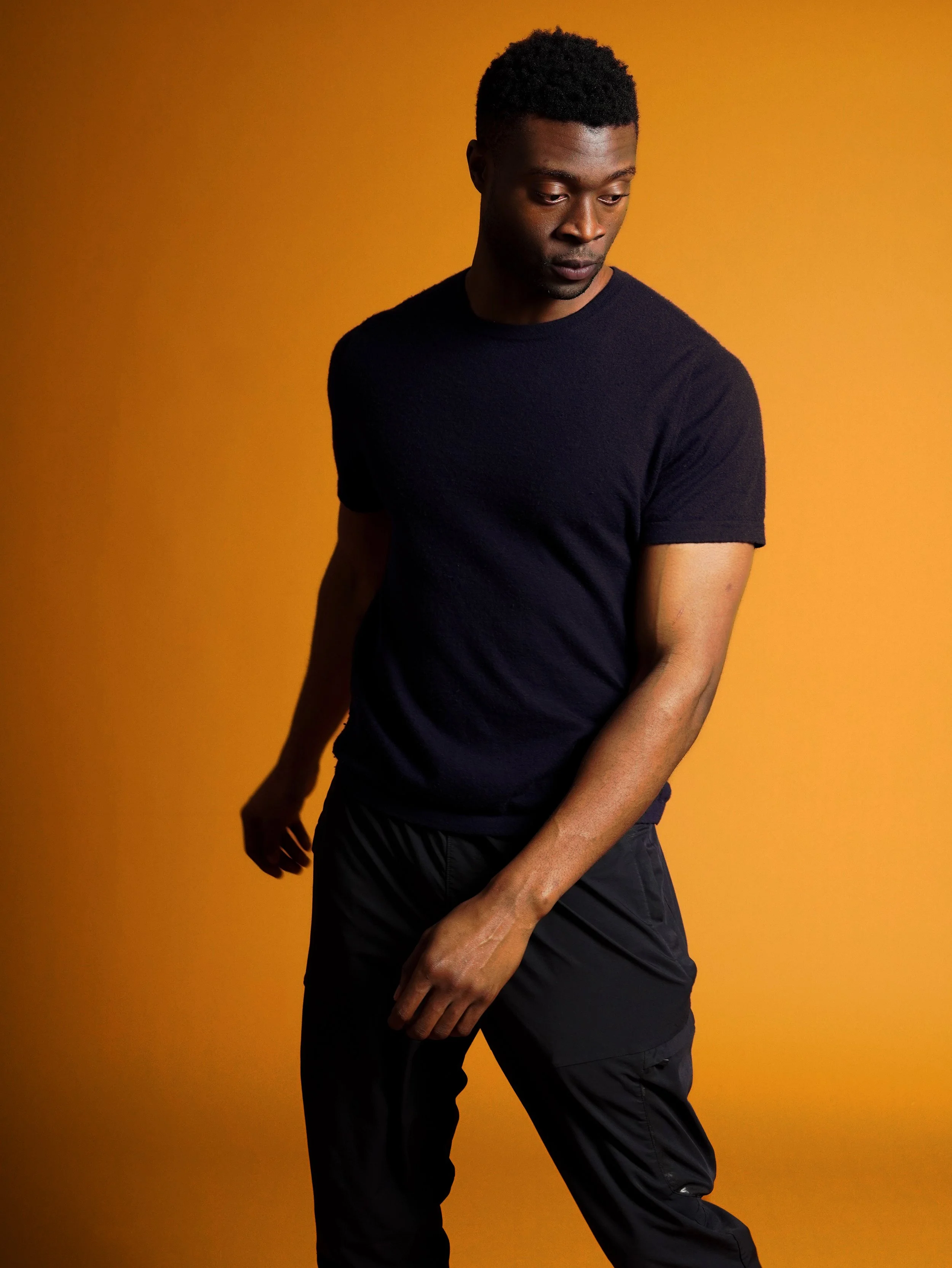 studio photo on orange background, motion shot