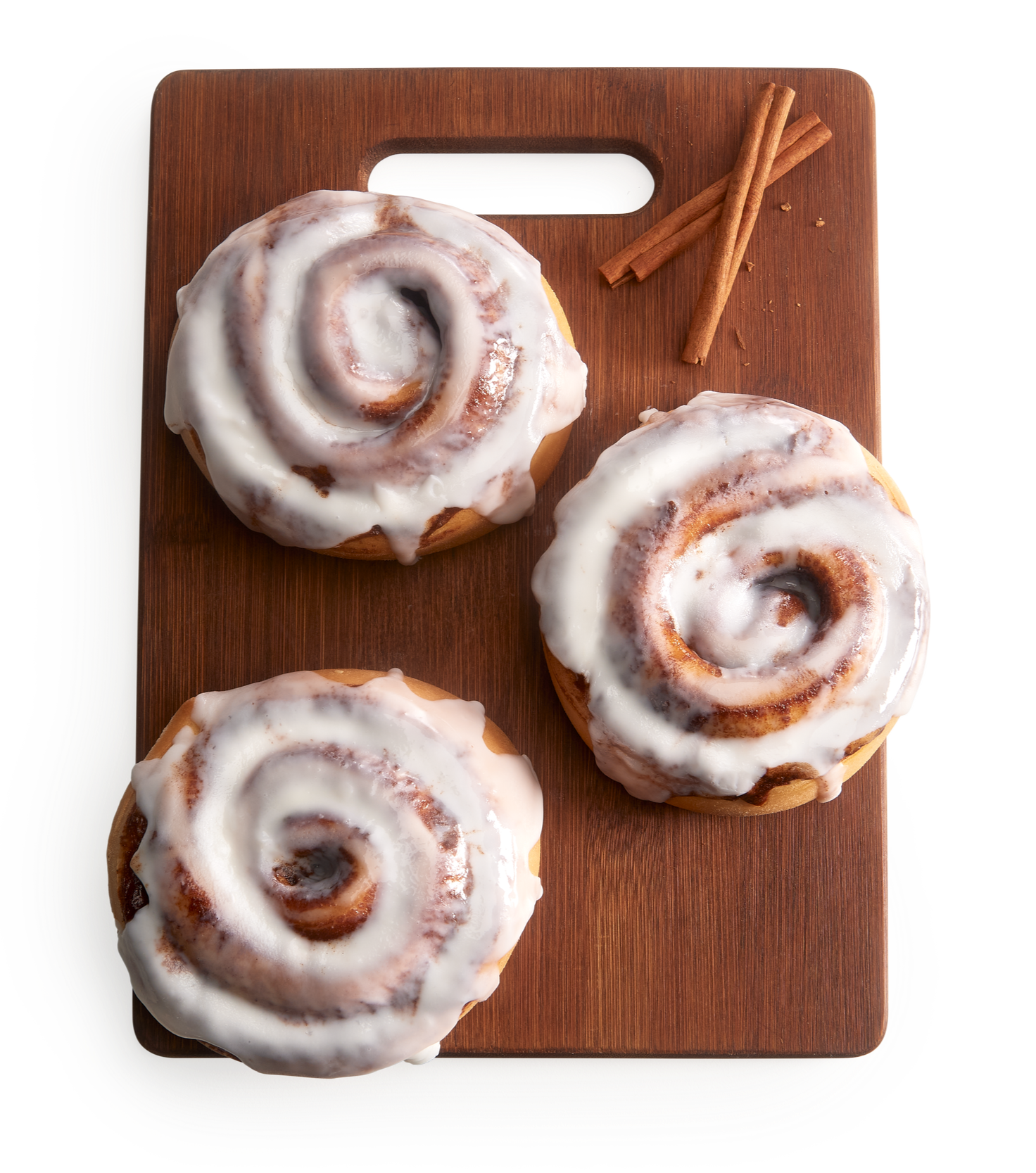 Tray with three cinnamon rolls.