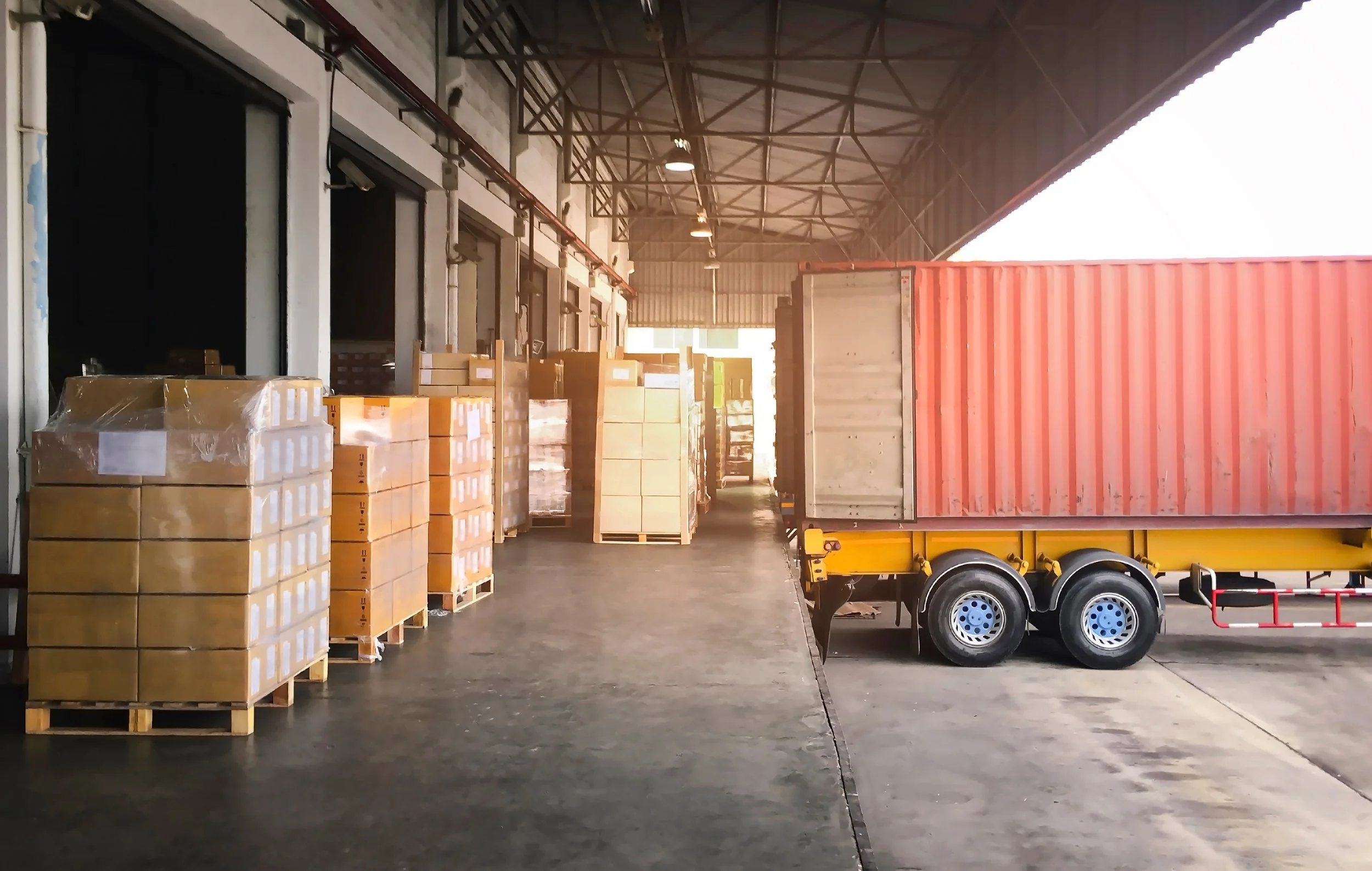 Image of Truck, pallets, and loading dock