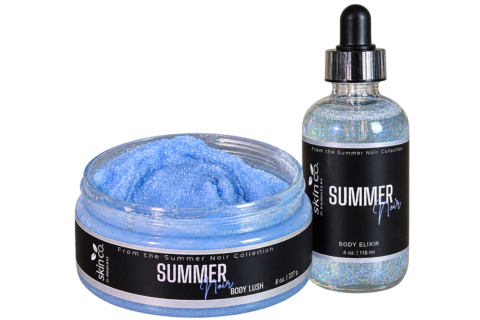 Skincare products from the Summer Noir collection by Skin & Co. including a blue body scrub and a body elixir with holographic glitter in a spray bottle.