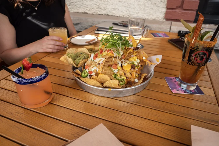 Nachos and cocktails on the patio