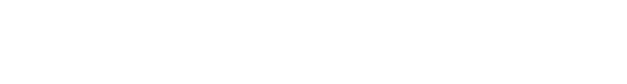 Close-up of the word 'COMPASS' in bold white letters on a black background.