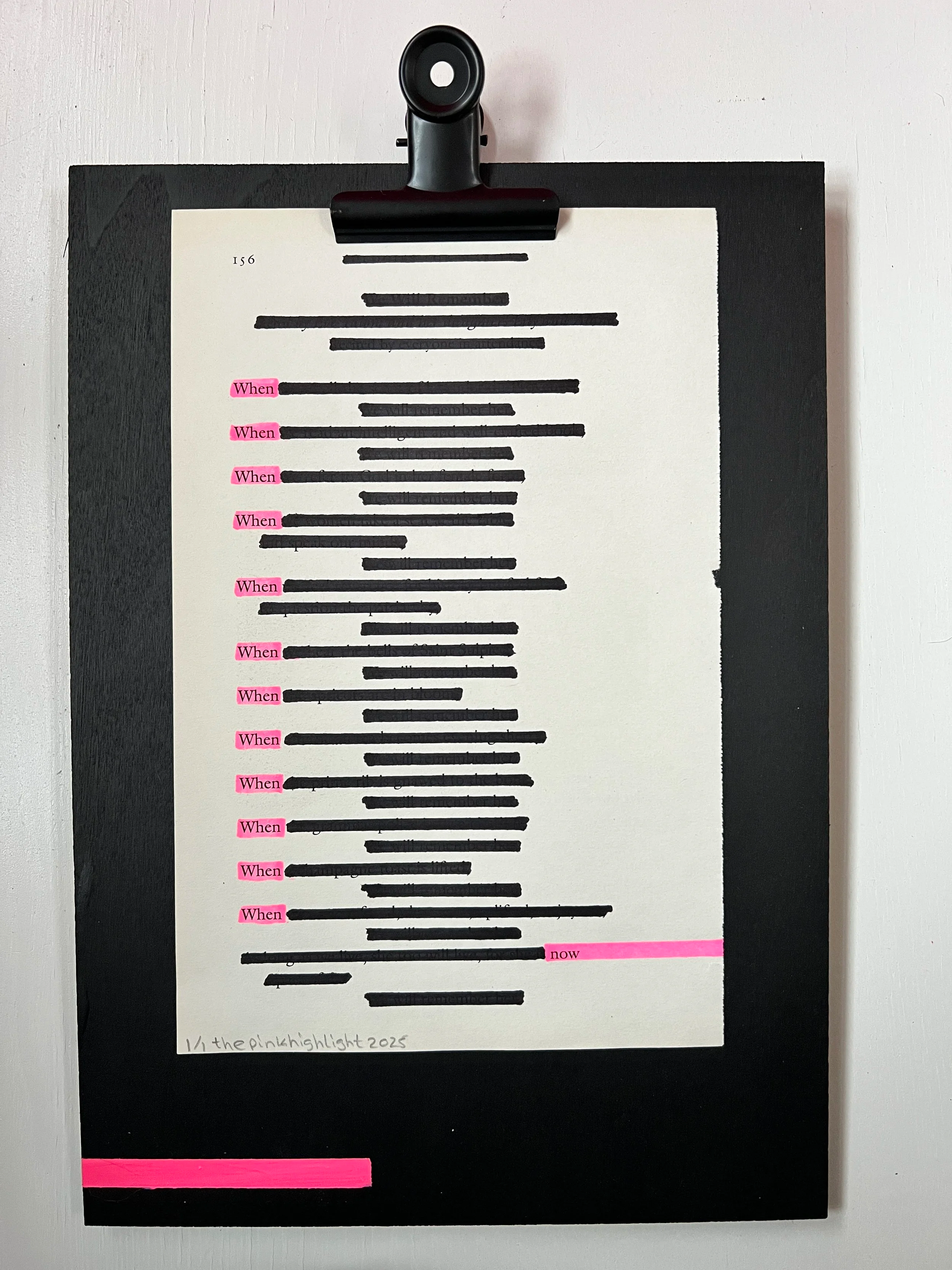 A piece of paper clipped to a black clipboard contains handwritten notes and printed text. The notes have the word 'When' highlighted in pink multiple times, with the word 'now' highlighted at the bottom. The paper is on a white surface with a black 