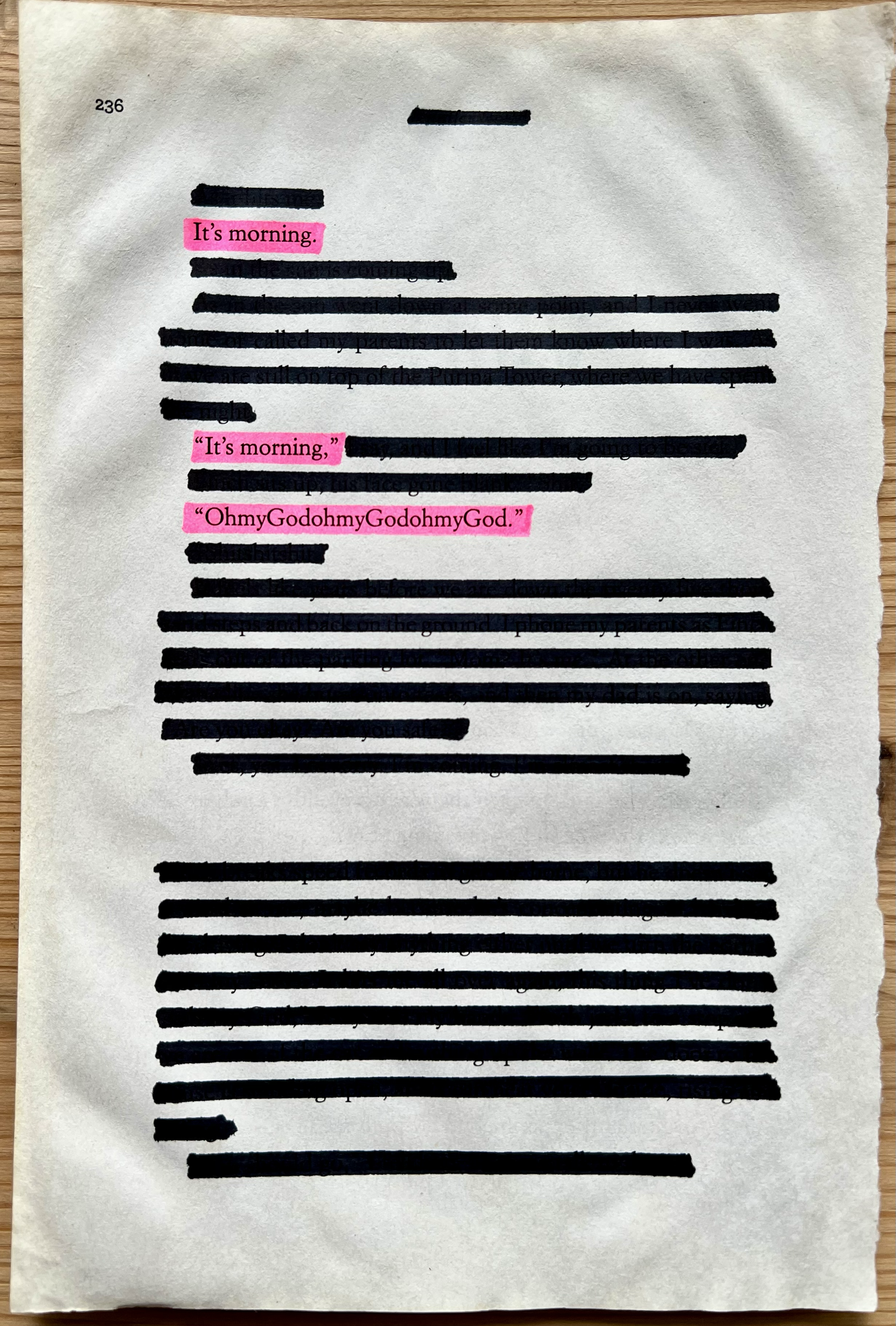 A sheet of paper with blacked-out text and highlighted pink phrases, including 'It's morning,' 'It's morning,' and 'Oh my God, oh my God.'