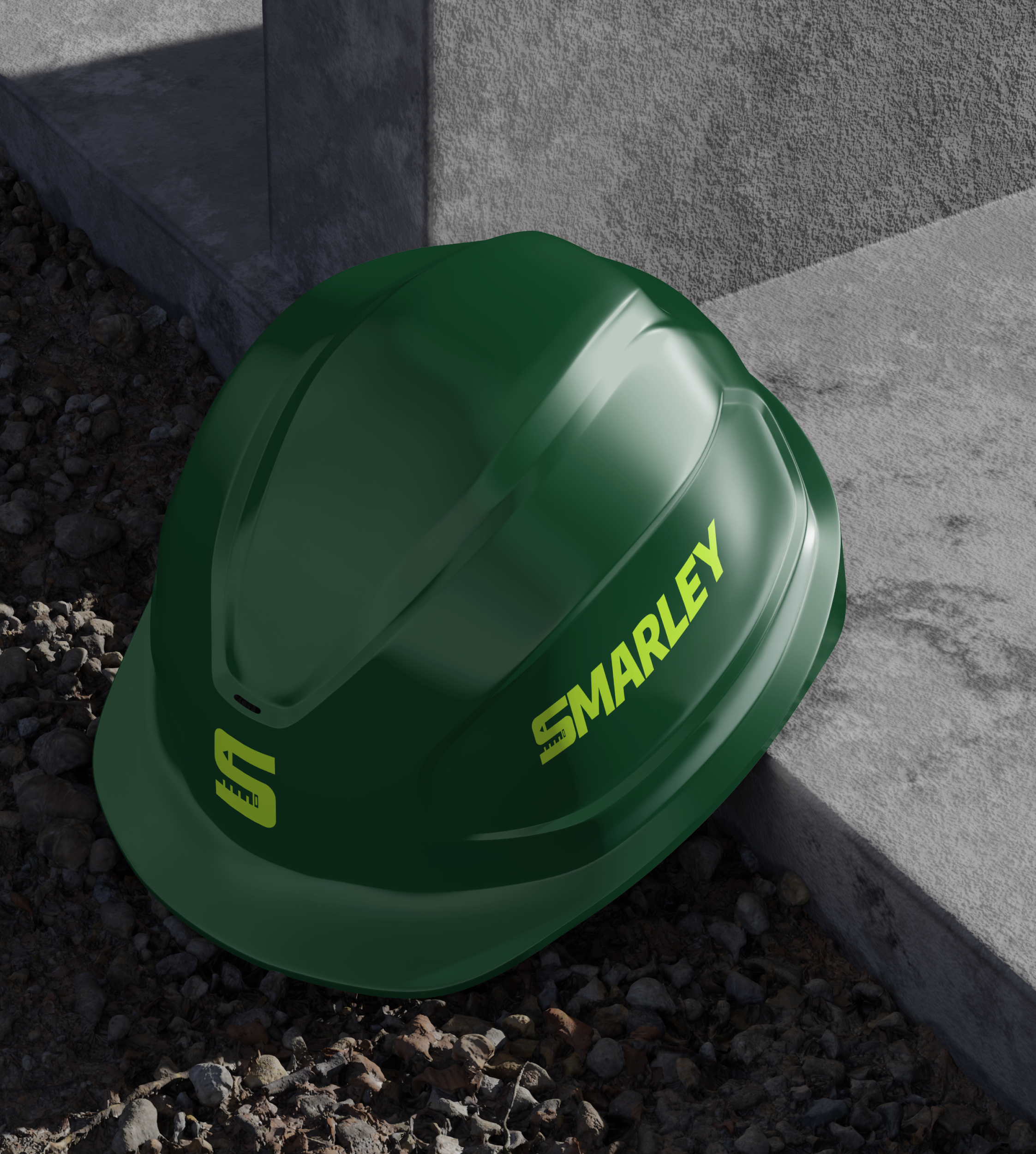 Green trash can with yellow writing placed on rocky ground near a concrete wall section.