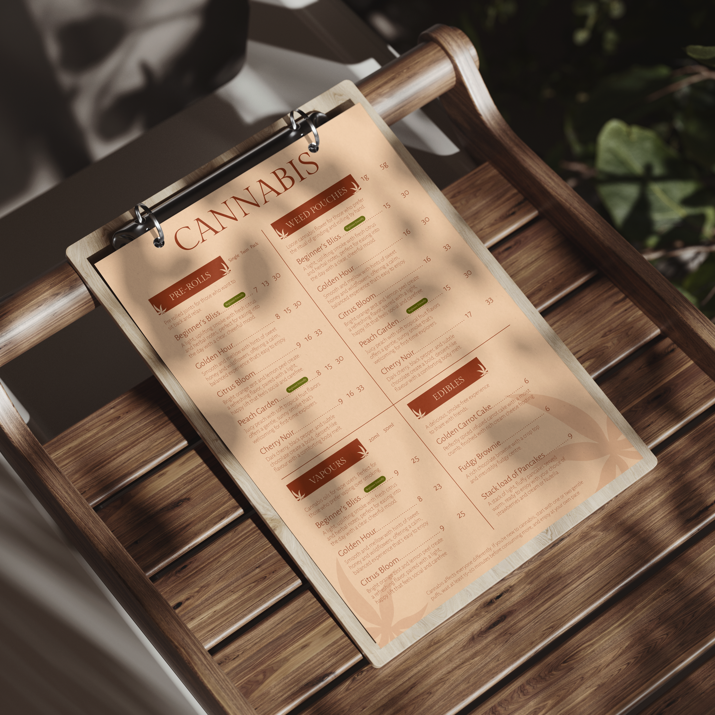 Close-up of a cannabis menu on a wooden stand, listing different cannabis strains and edibles, with a background of green foliage.