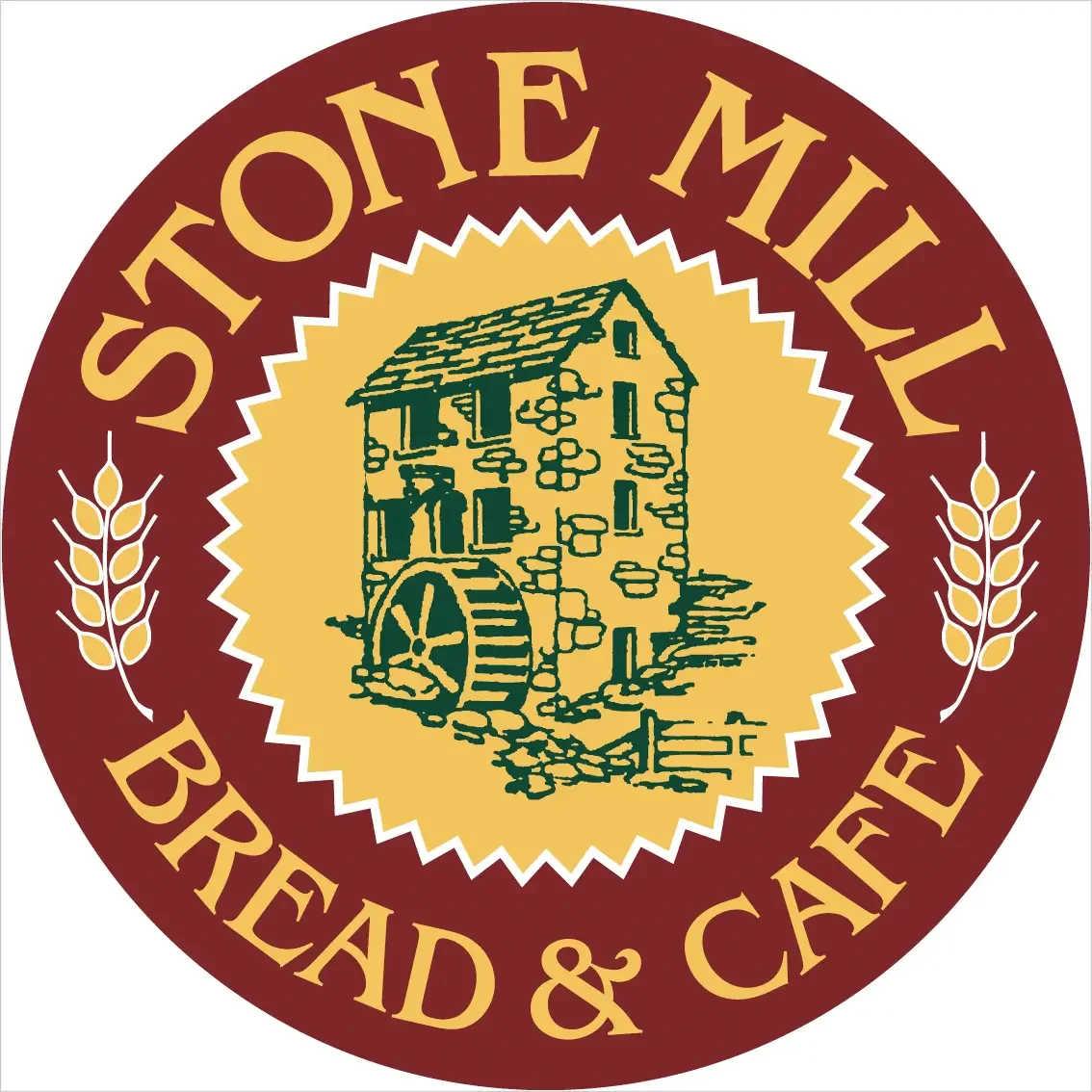 Logo for Stone Mill Bread & Cafe featuring a yellow circle with a central illustration of a stone mill house and water wheel, surrounded by a red border with the text 'Stone Mill Bread & Cafe' and wheat illustrations.