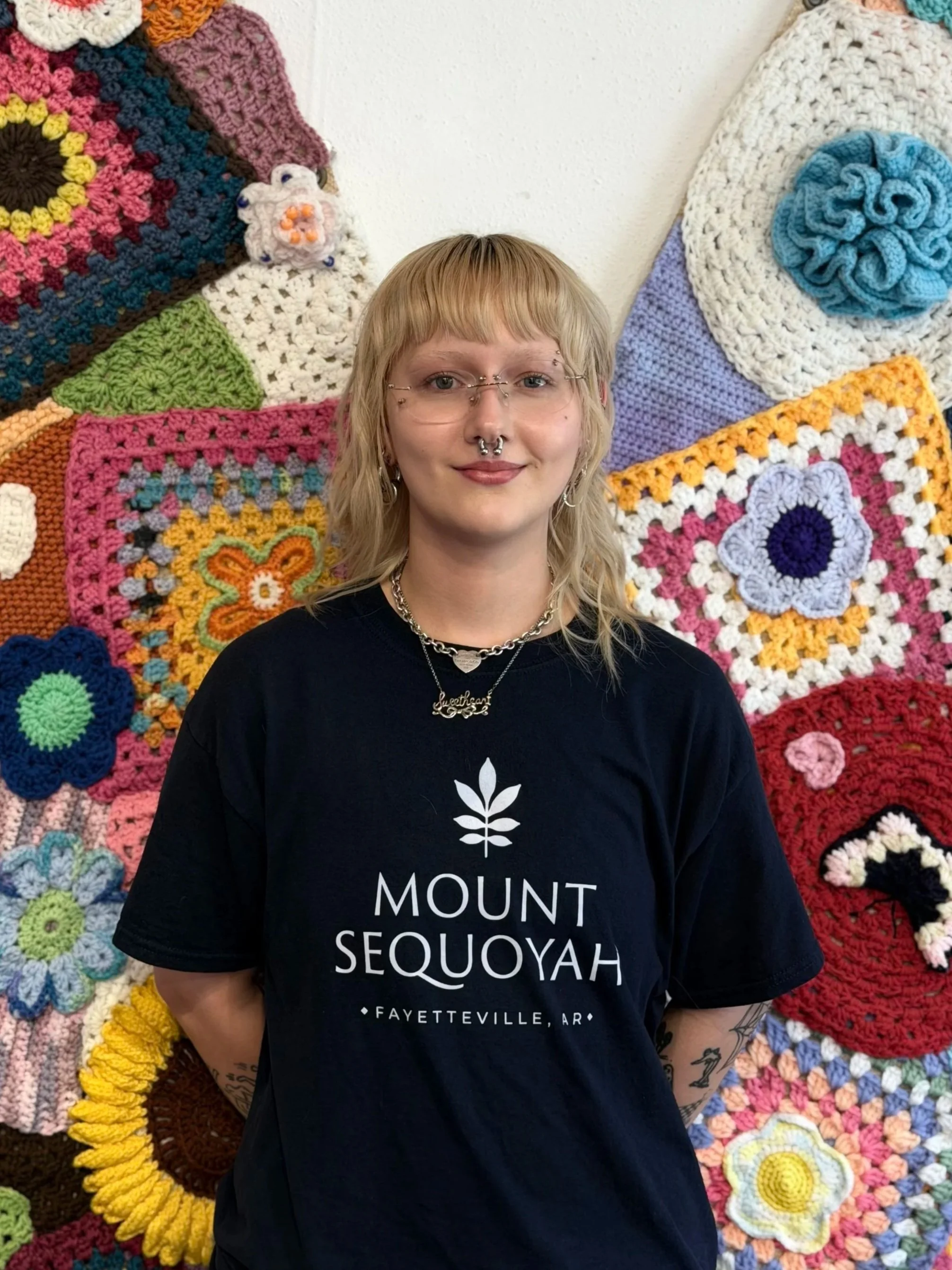Woman in a blue shirt saying Mount Sequoyah