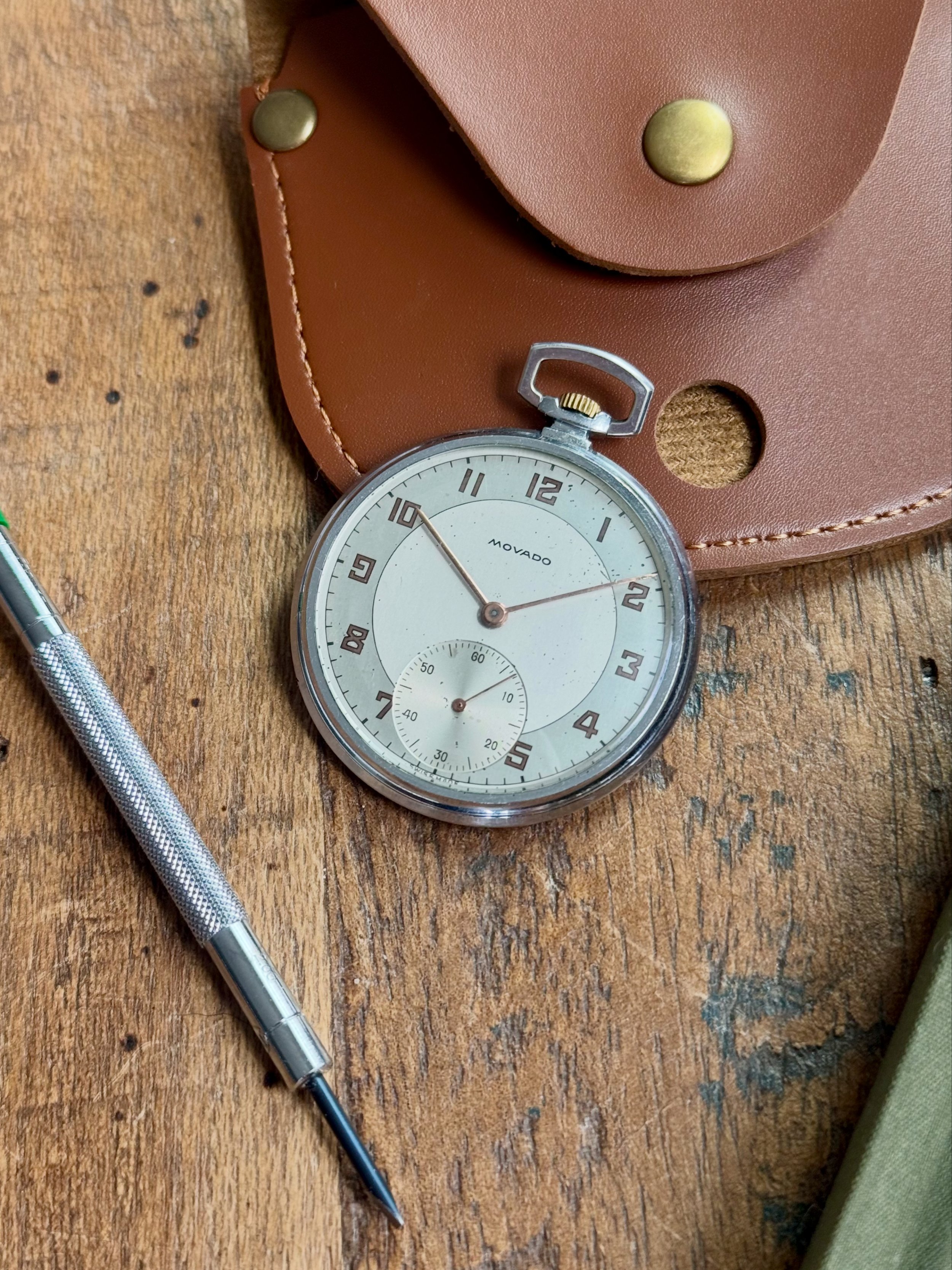 A vintage Movado pocket watch.