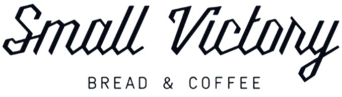 Logo for Small Victory Bread & Coffee with stylized text.