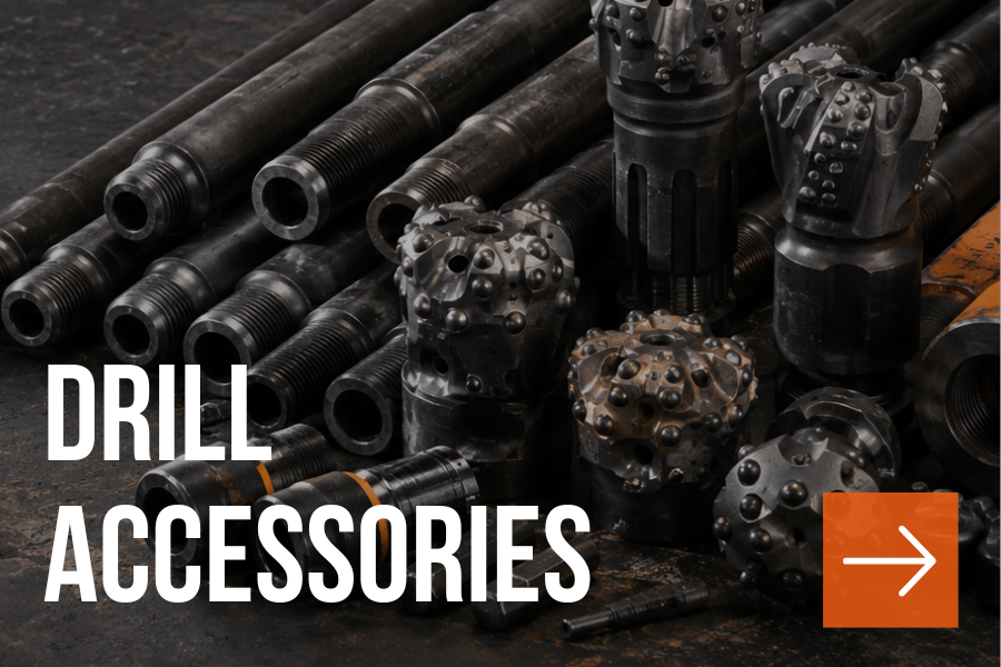 Various drill bits and accessories on a dark surface, including threaded rods and tungsten carbide drill heads.