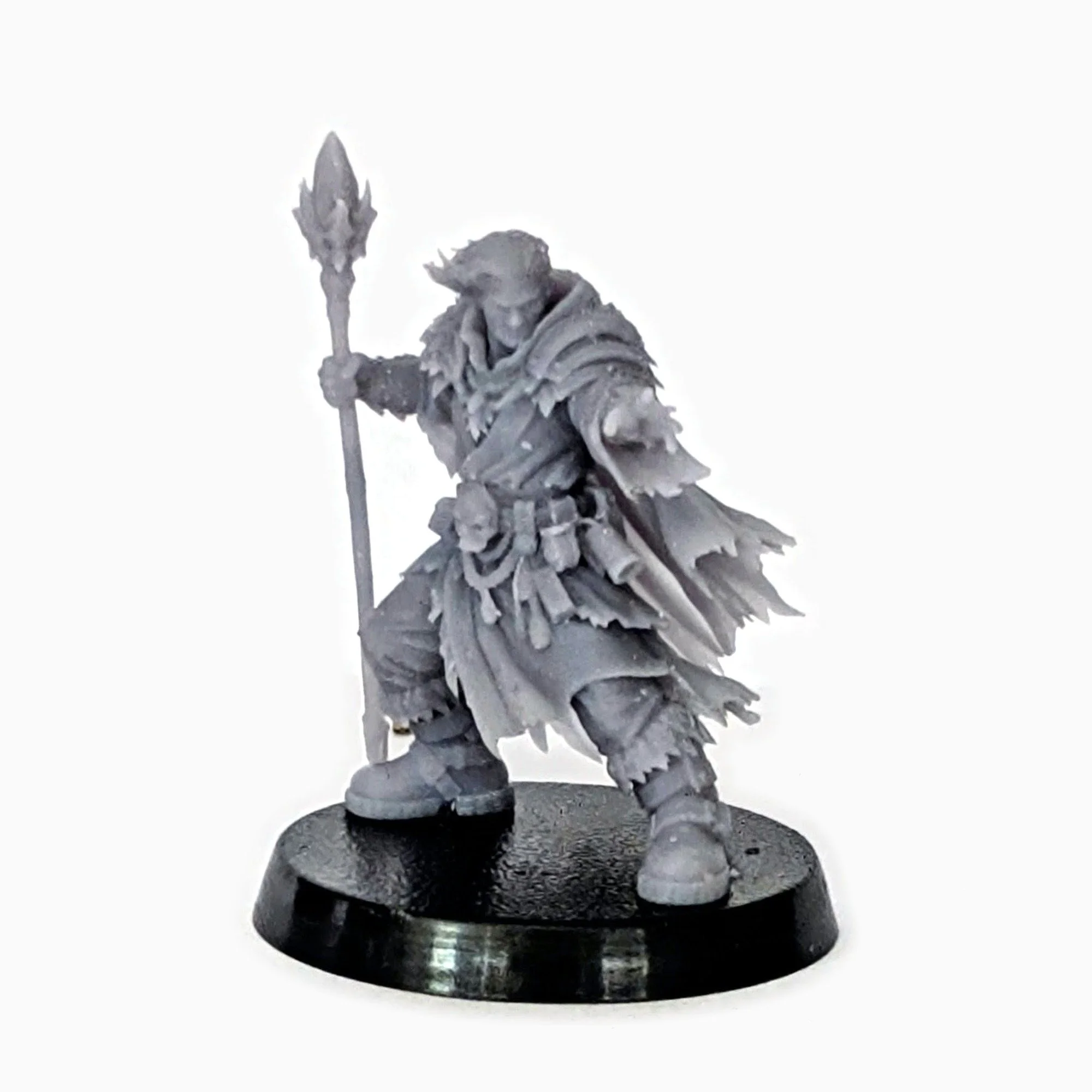 Mage miniature casting with a crystal-tipped staff, unpainted resin
