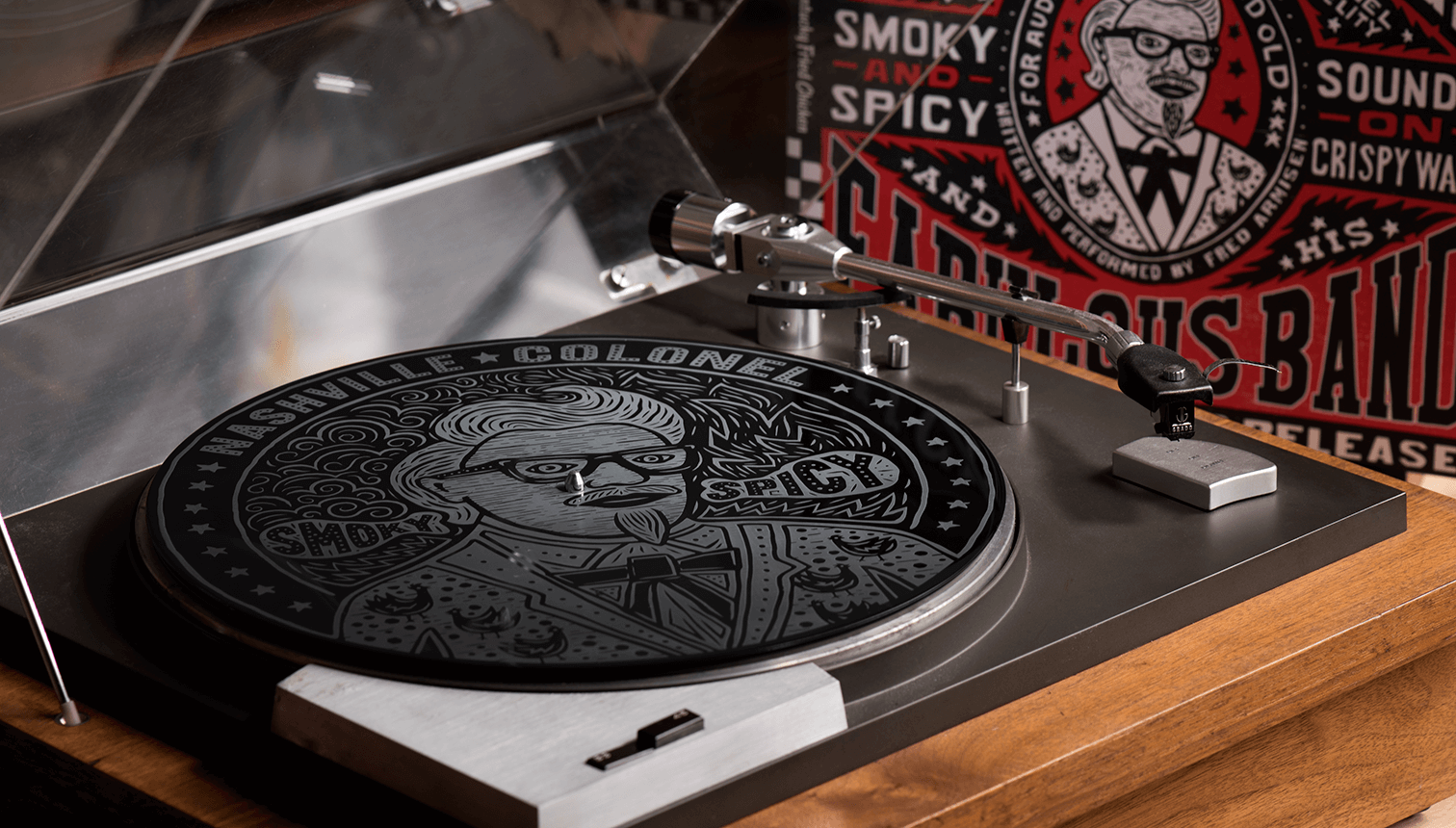 Custom laser-cut design for a 'Smokey and Spicy' branded turntable record display, custom fabrication by MC Laser Labs.