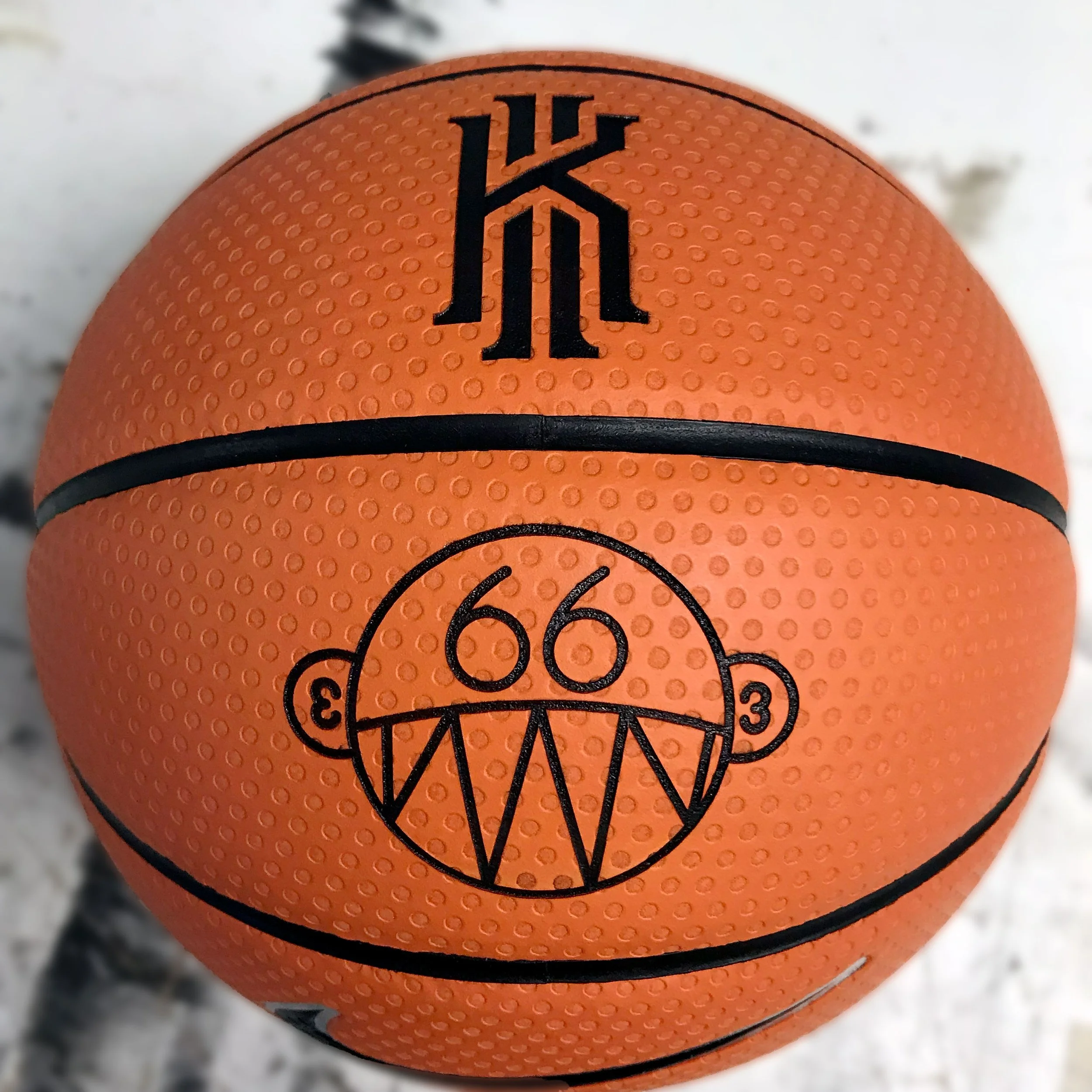CO2 laser engraved orange basketball with Nike logo, custom laser engraving by MC Laser Labs.