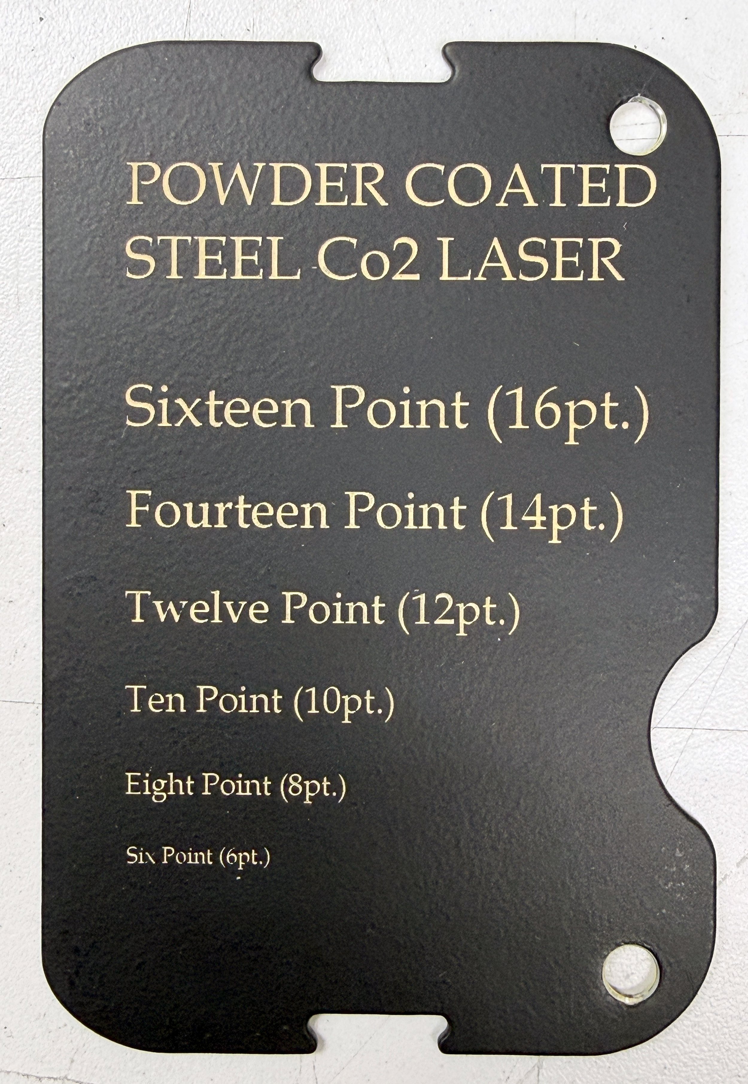 CO2 laser engraved black reference plate showing screen printing point sizes from six to sixteen point fonts, custom laser engraving by MC Laser Labs.