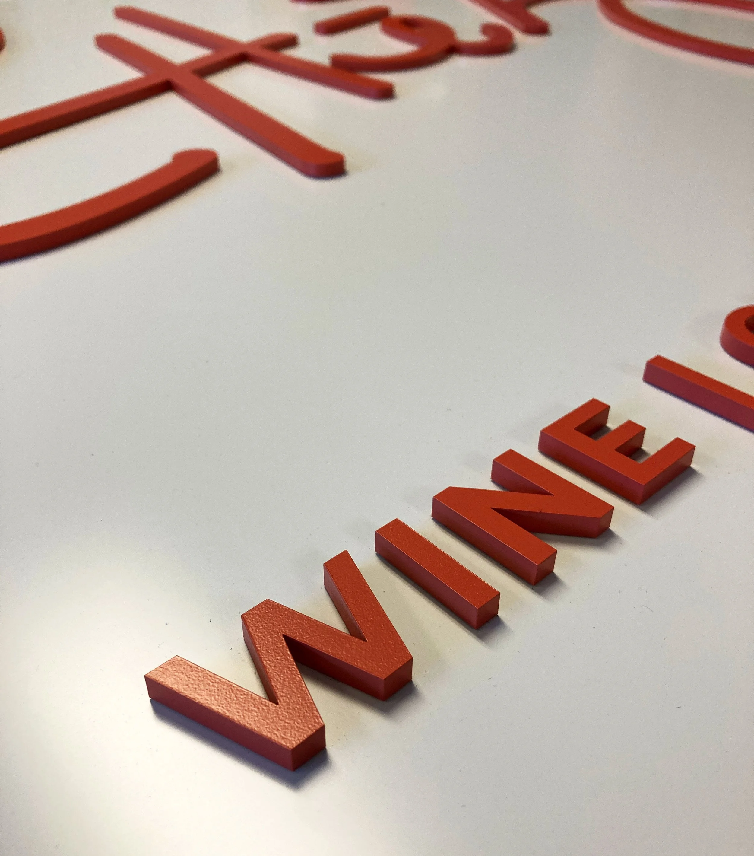 laser cut acrylic dimensional sign for wine bar and restaurant. custom laser cut acrylic and fabrication by MC Laser Labs.