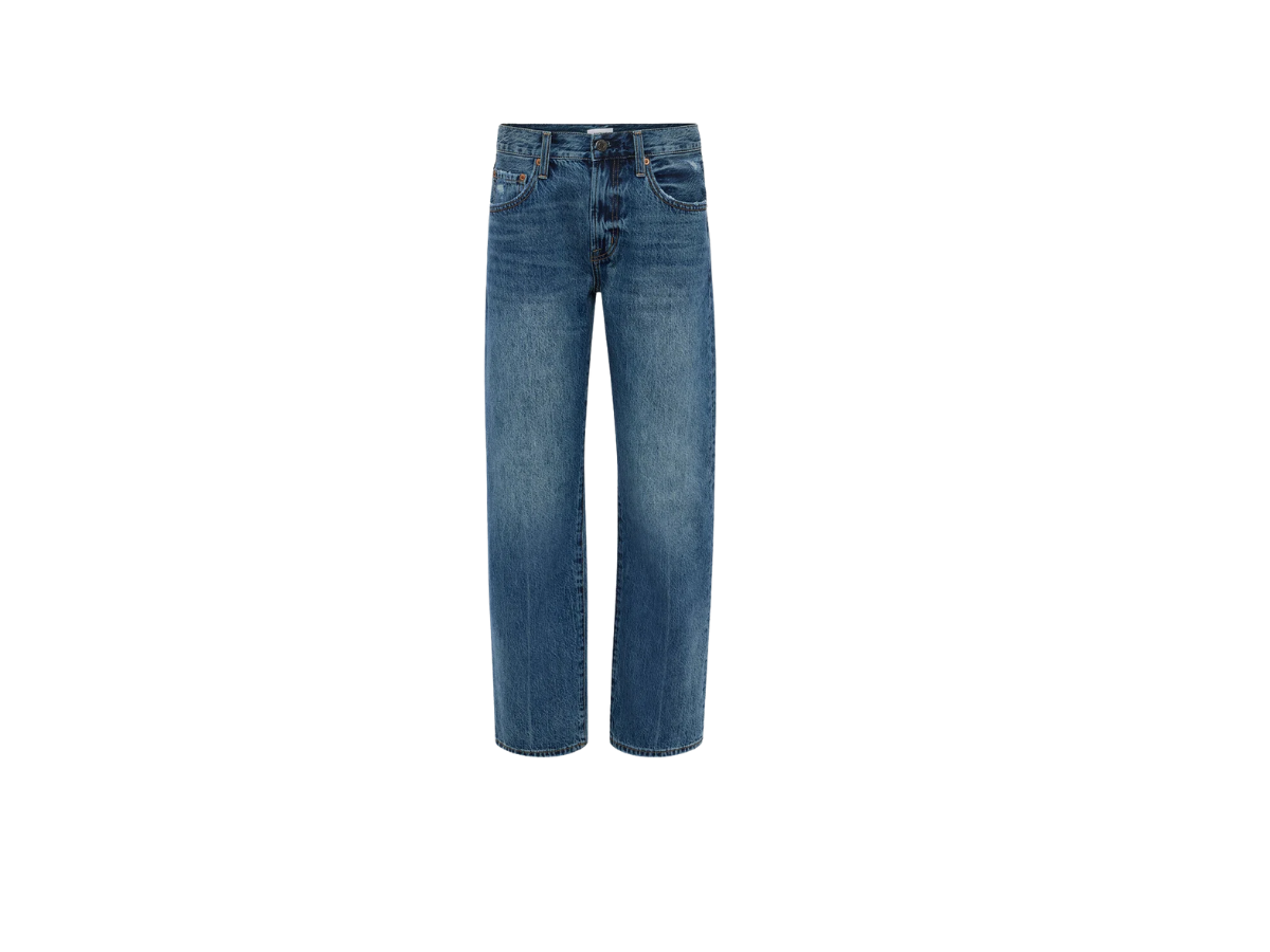 Pair of women's petite lexi Pistola blue denim jeans, isolated on a white background.