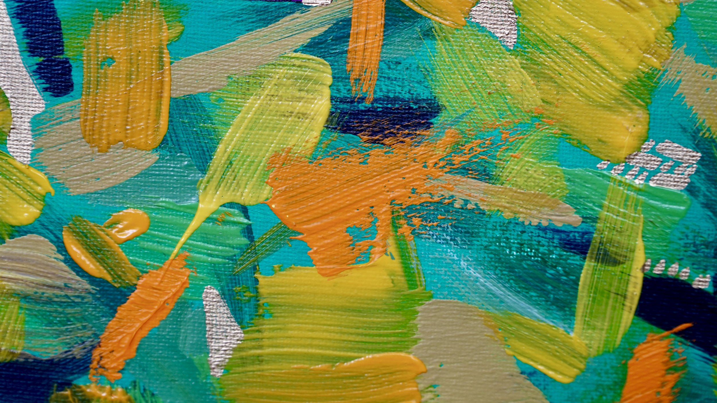 Close-up of an abstract painting with colorful brush strokes in shades of green, yellow, orange, blue, and beige.