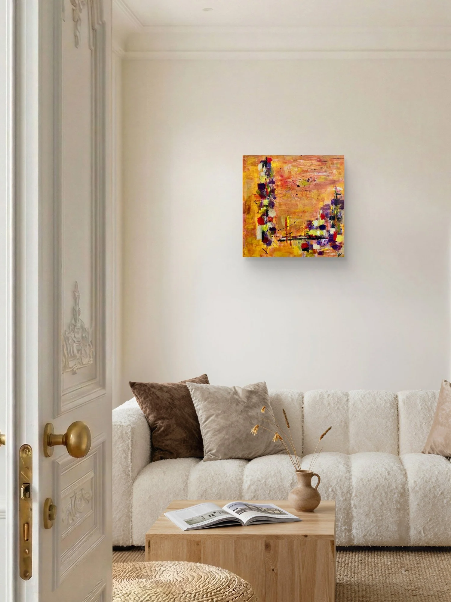 Incandescent Metamorphosis abstract fine art print by Virginie Bergar — 24 x 24 in displayed above a cream sofa in a warm contemporary living room