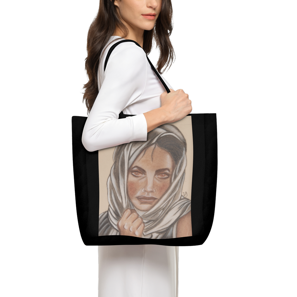 Where Time Balls Quiet black art tote bag featuring an original artwork by Virginie Bergar — front  view worn over the shoulder