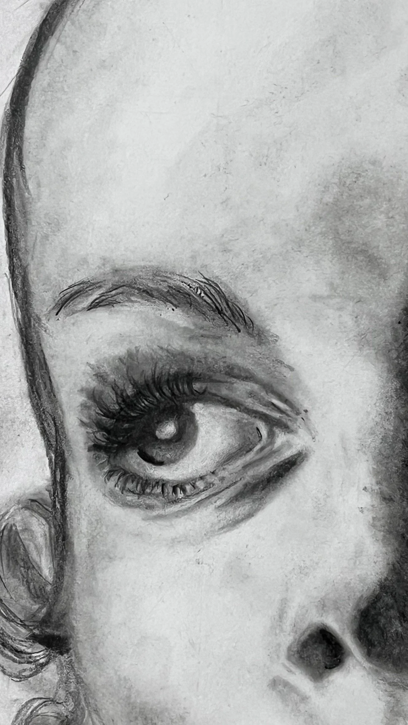 lose-up of the eye and delicate graphite work in Where Time Falls Quiet by French artist Virginie Bergar.