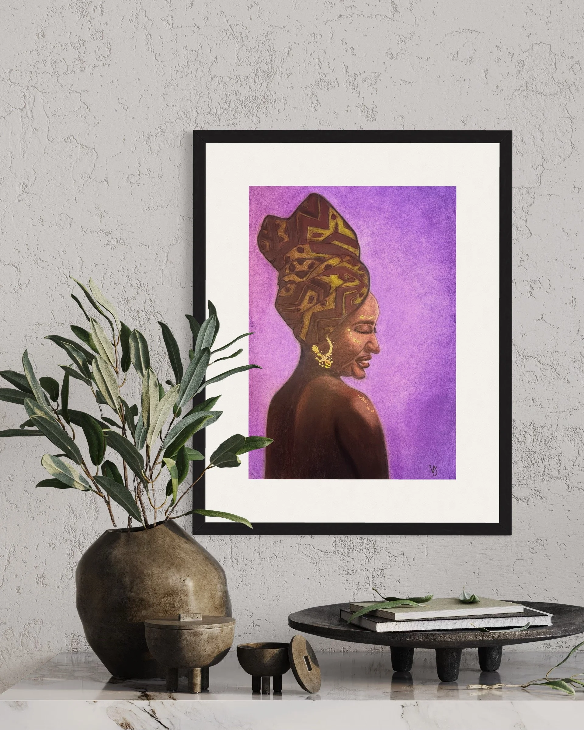Woman of Ivory and Ebony by Virginie Bergar displayed above a contemporary console with natural textures and greenery