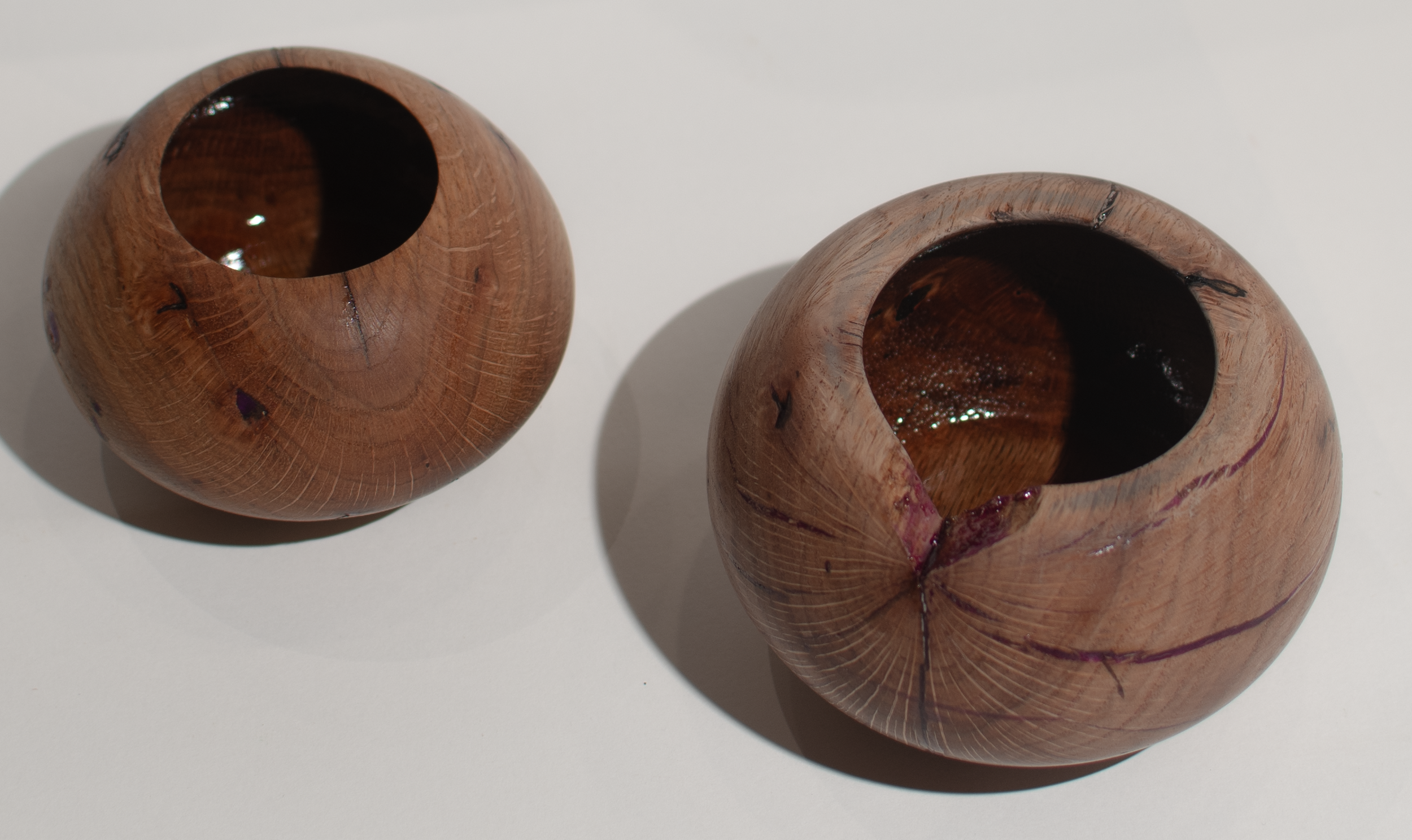 Color resin cracked oak cup with a coating on the inside.