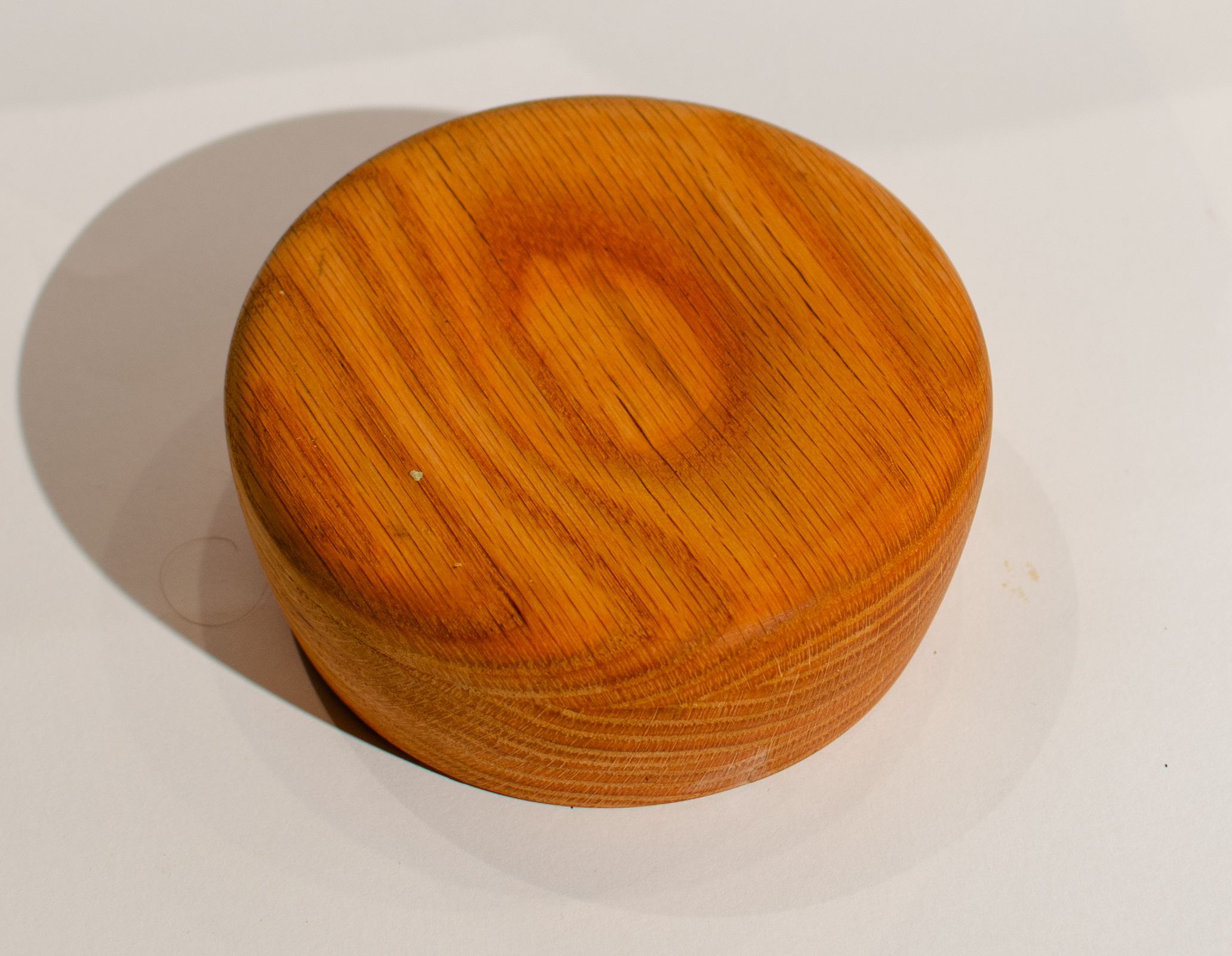 Wooden dish bottom with relief. Boiled linseed oil and paste wax finish.