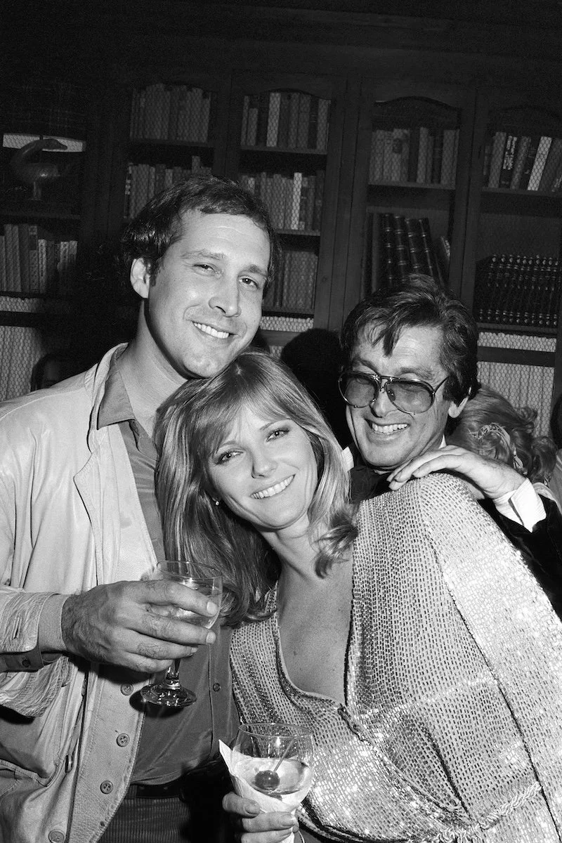 Chevy Chase, Cheryl Tiegs, & Robert Evans