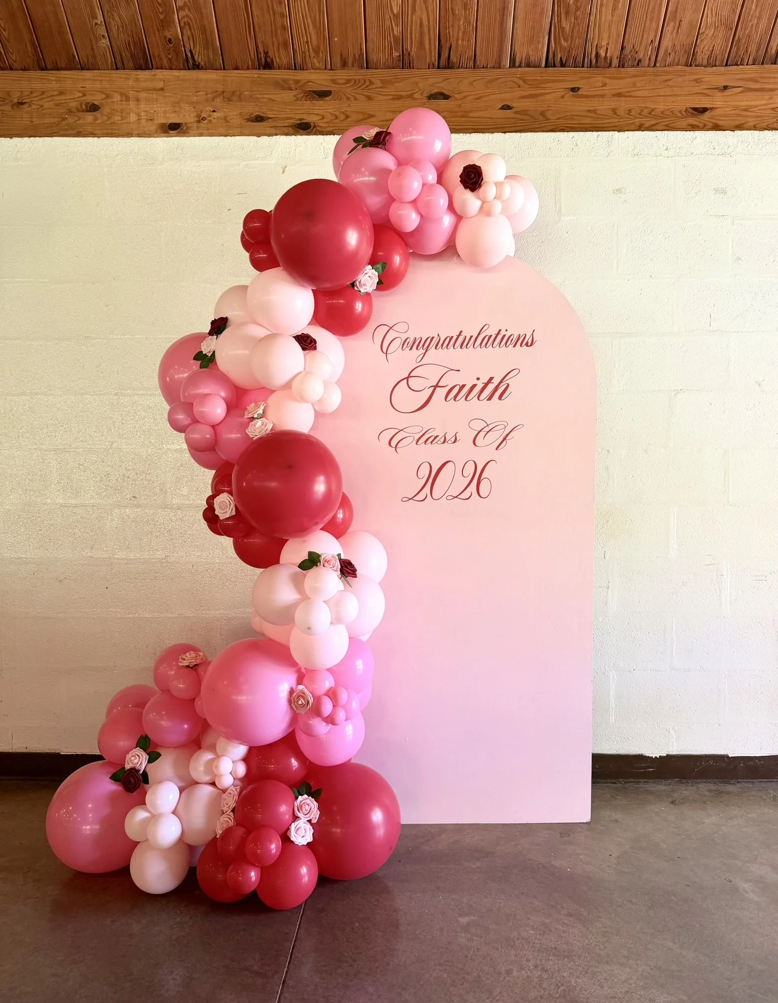Graduation balloon arch w/ florals Buffalo