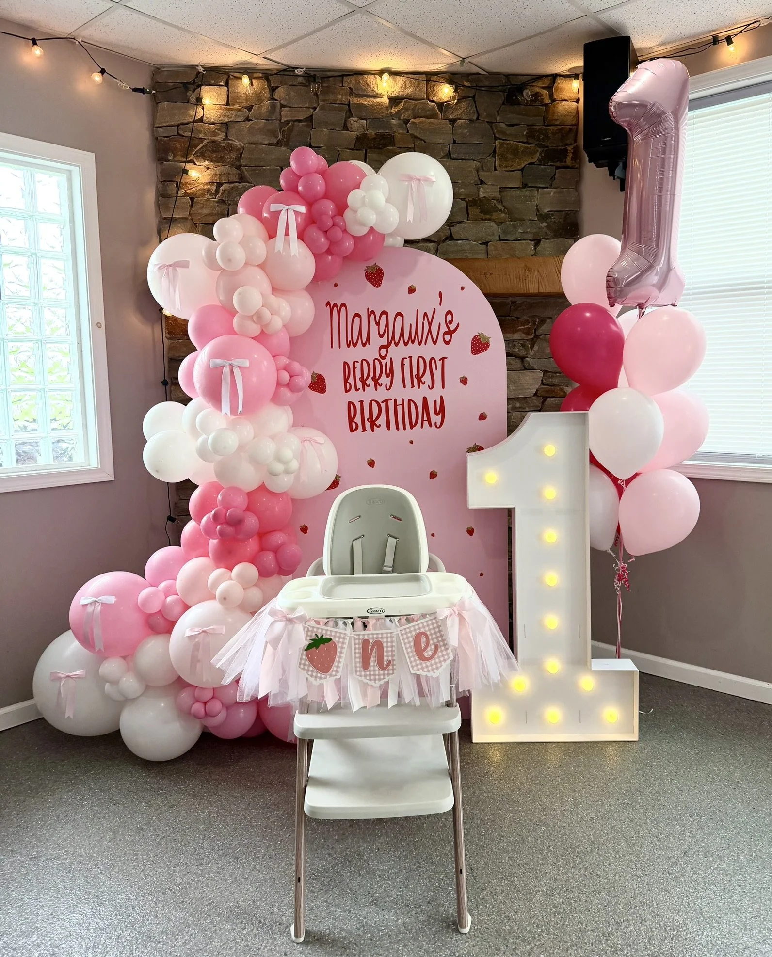 Berry first birthday balloon arch Buffalo