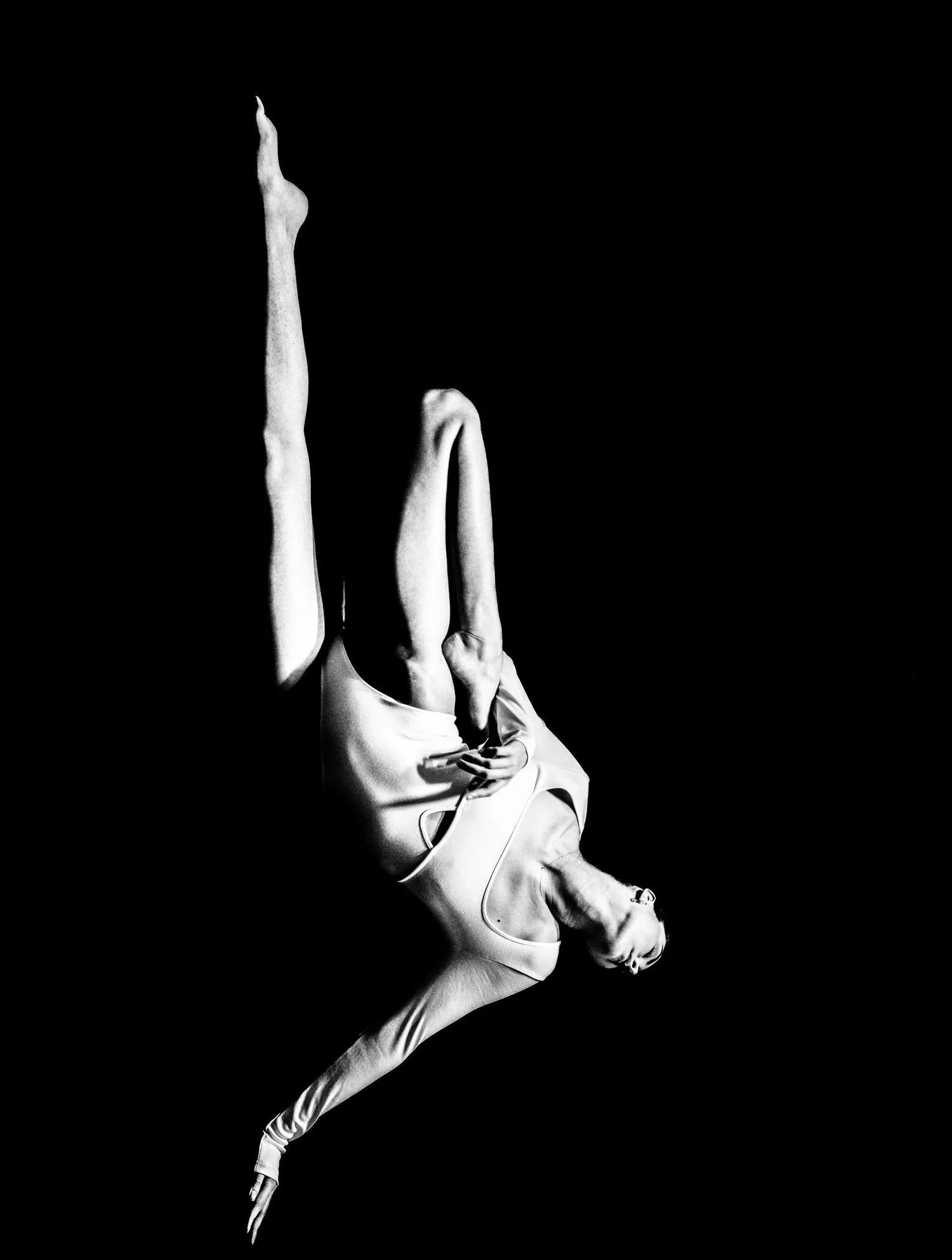 Black and white suspended movement study from the Unfiltered fashion photography series by CAMR Visuals