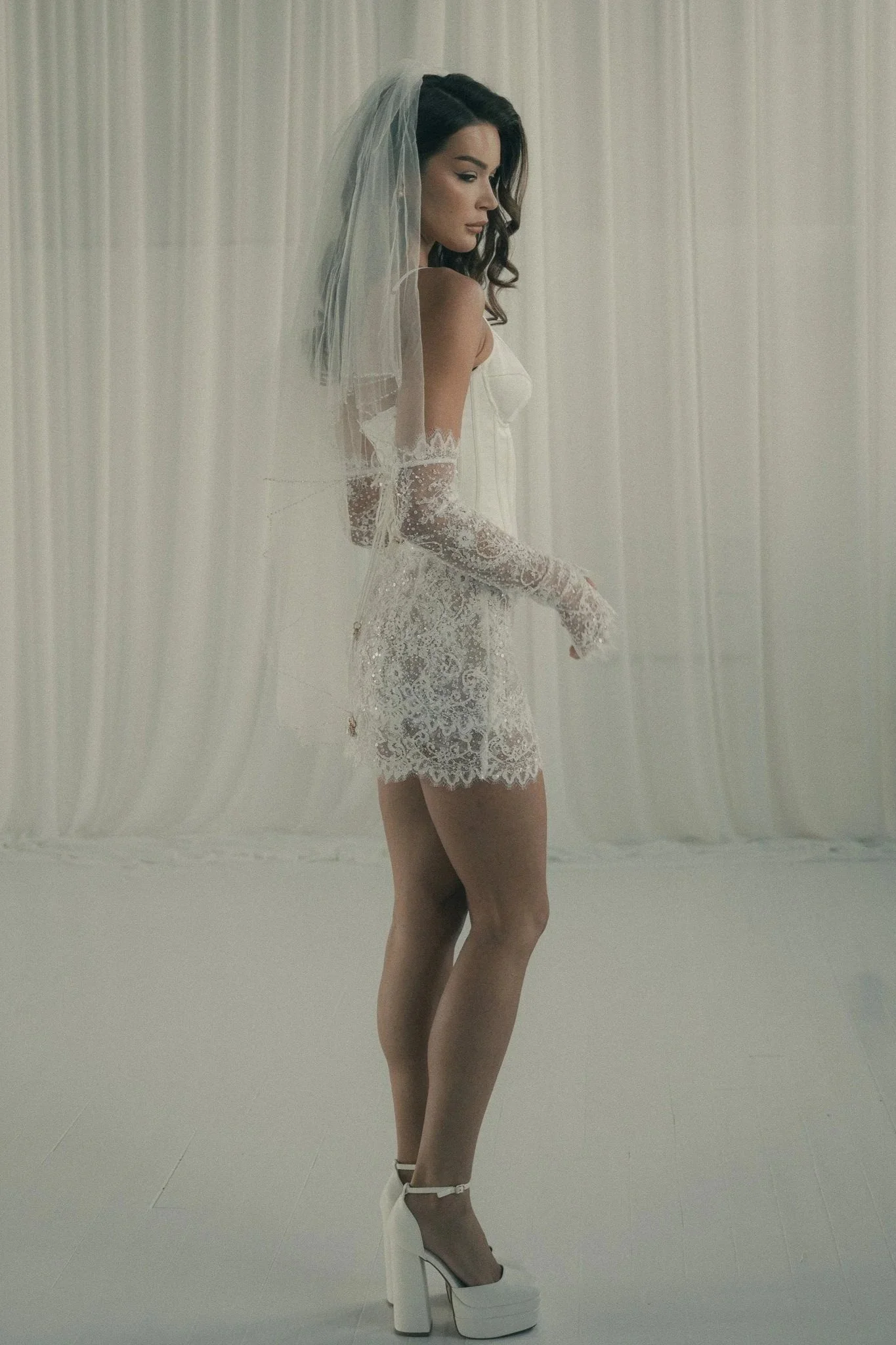 Editorial bridal portrait featuring a Sydney Lane wedding dress