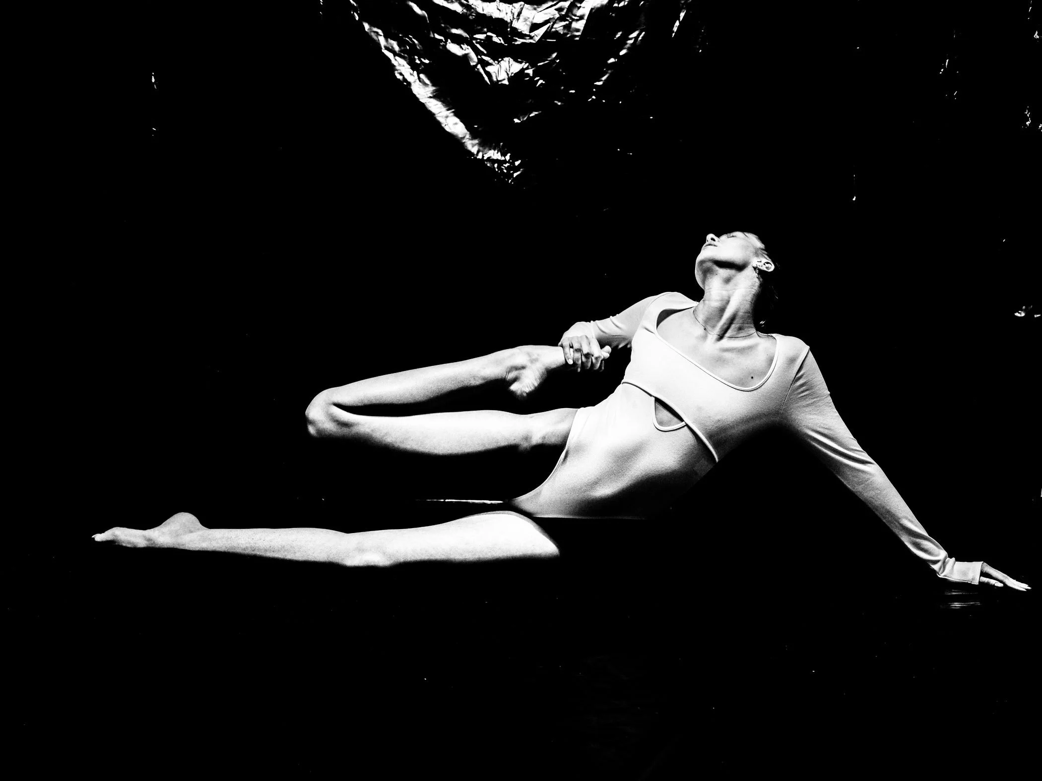 Black and white floating studio figure from the Unfiltered fashion photography series by CAMR Visuals