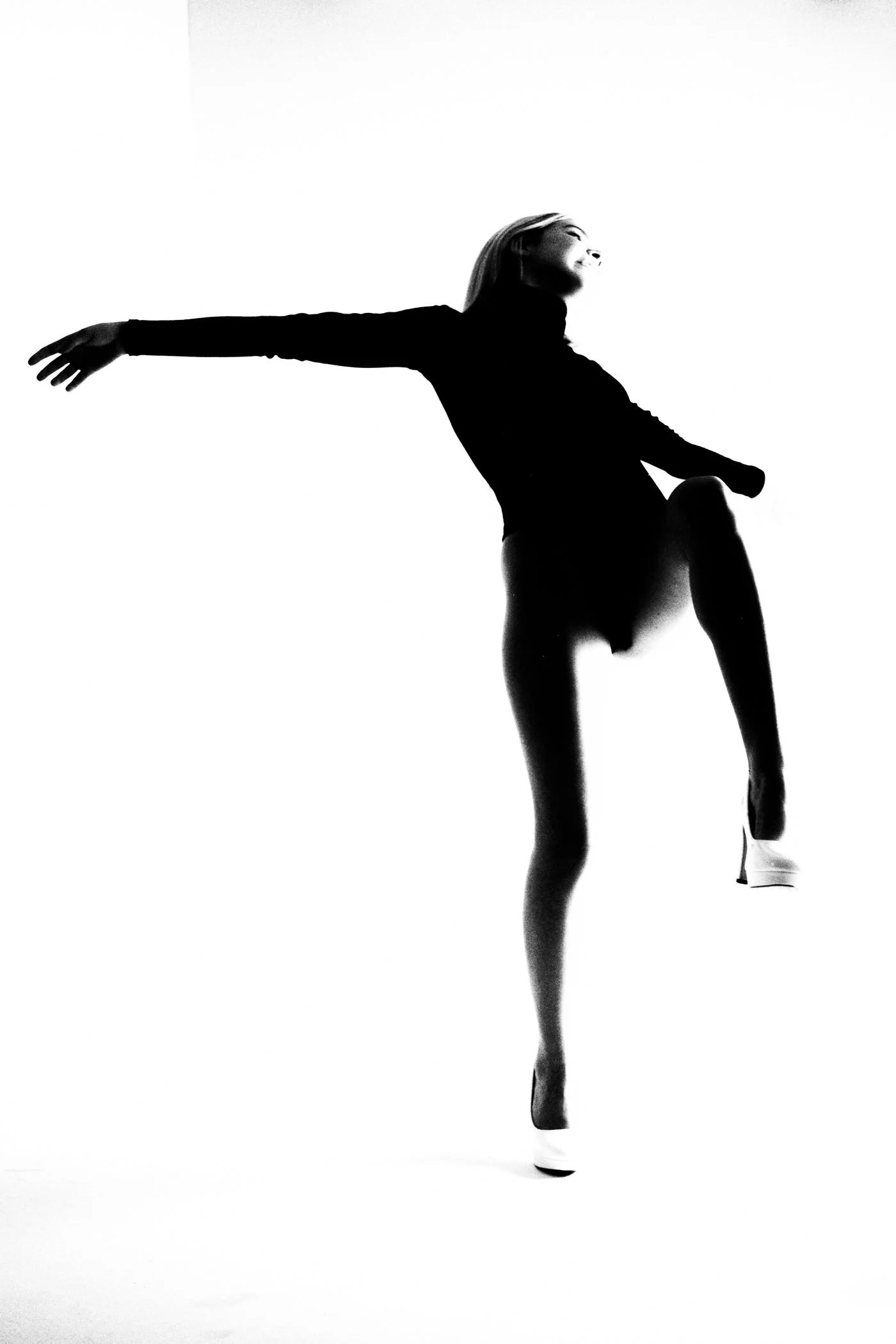 Black and white graphic movement silhouette from the Unfiltered fashion photography series by CAMR Visuals