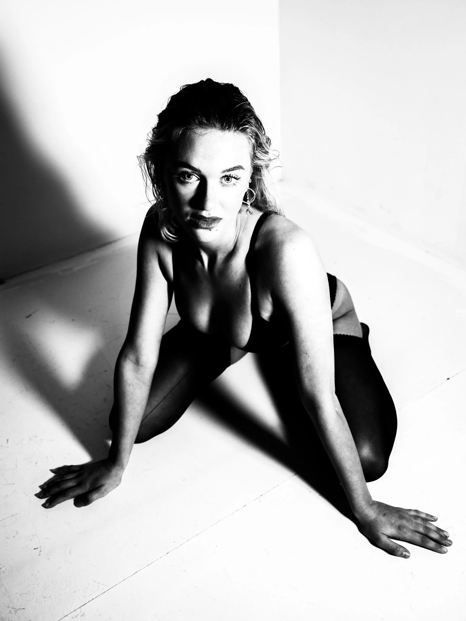 Black and white seated monochrome beauty portrait from the Unfiltered fashion photography series by CAMR Visuals