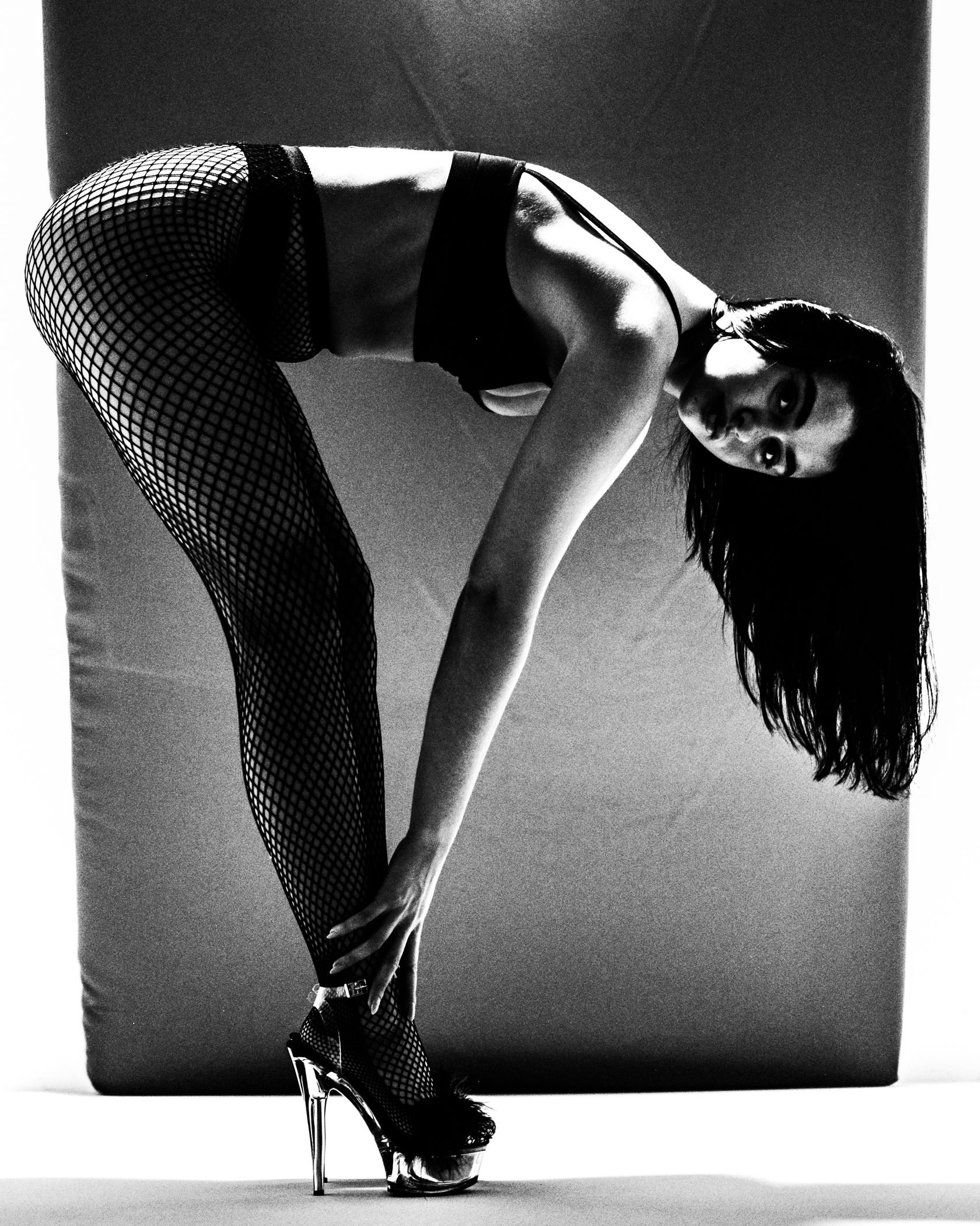 Black and white graphic full length leg pose from the Unfiltered fashion photography series by CAMR Visuals