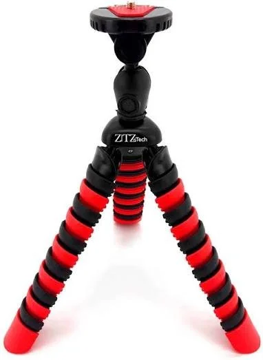 A compact tripod with red and black striped legs and a black mounting head.