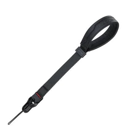 A black retractable dog leash with a loop handle and a metal clip.