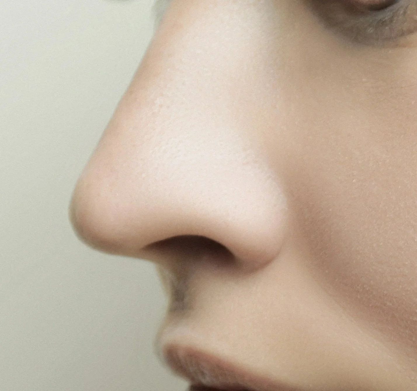 Close-up of a person's nose and lips.