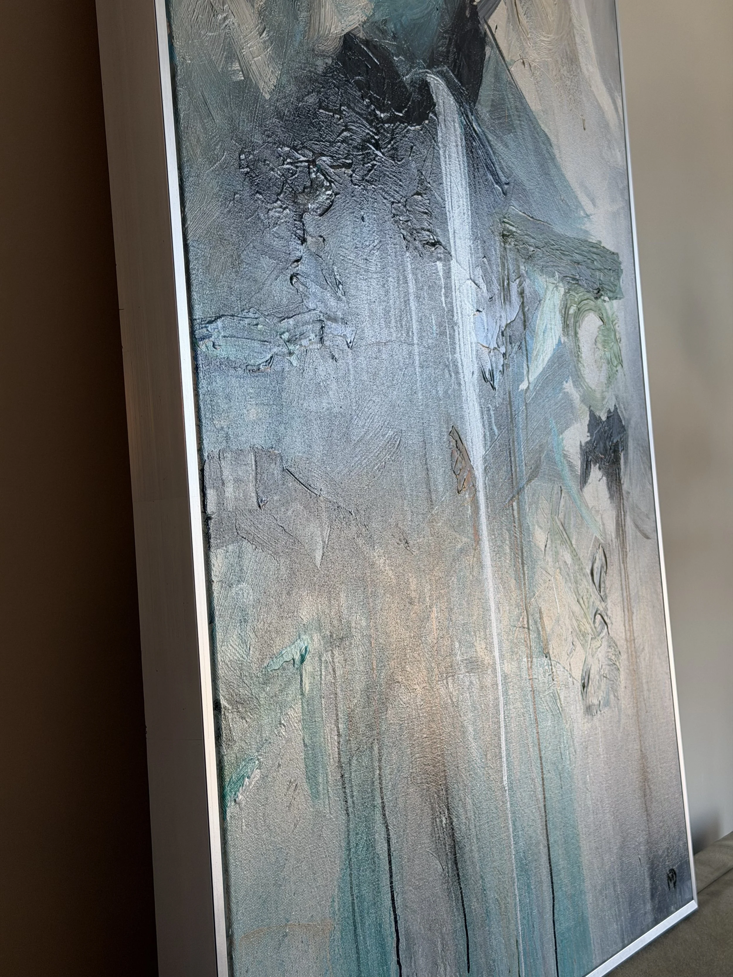 An abstract painting with textured layers, vibrant colors, and dynamic brushstrokes displayed on a flat screen.