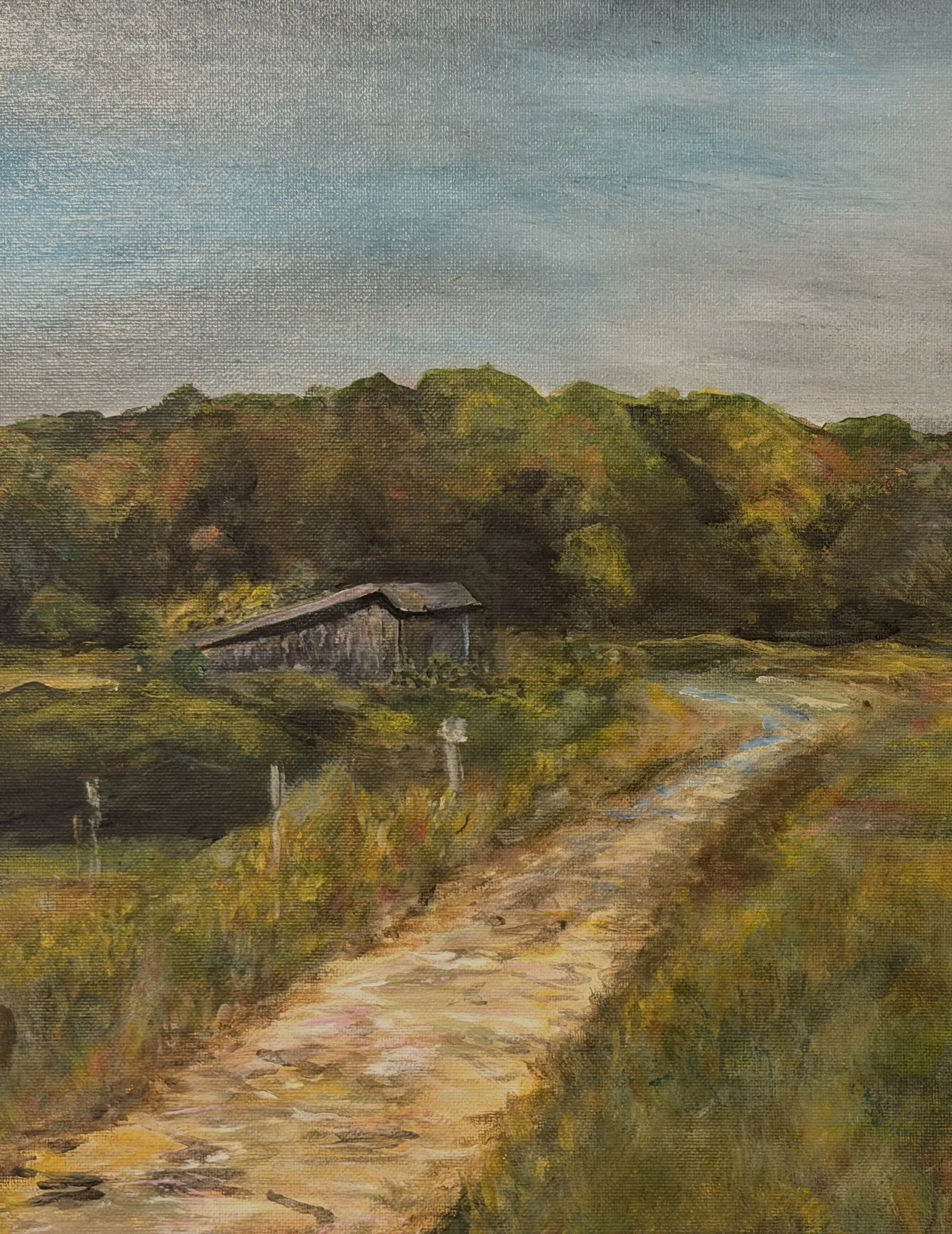 A landscape painting of rolling hills with trees, a small house, and a dirt road under a cloudy sky.