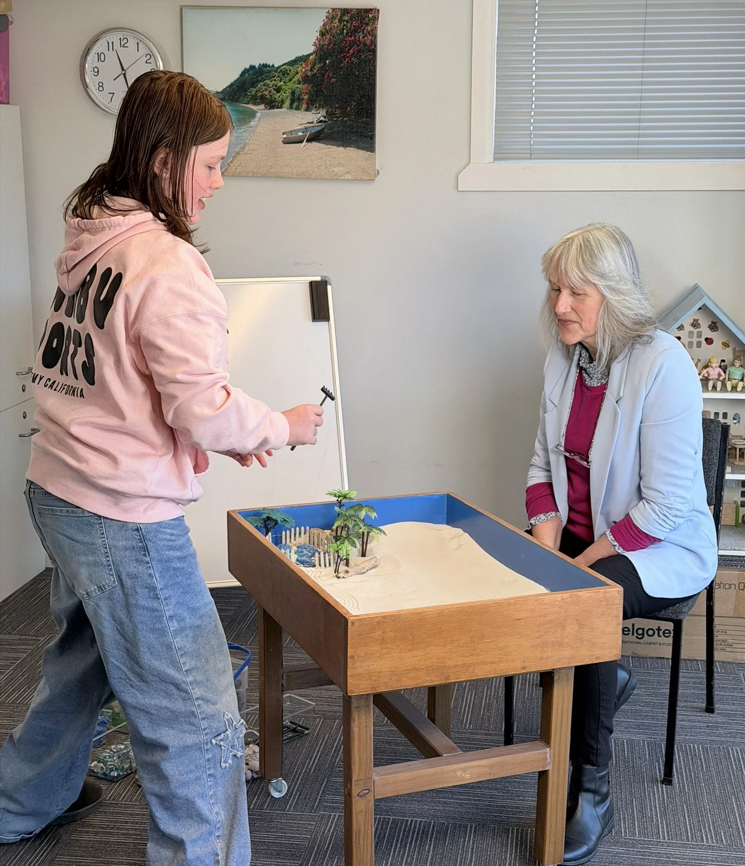 child engaged in a counselling session using sand tray therapy during a counselling session at Pakuranga Counselling Centre in East Auckland.