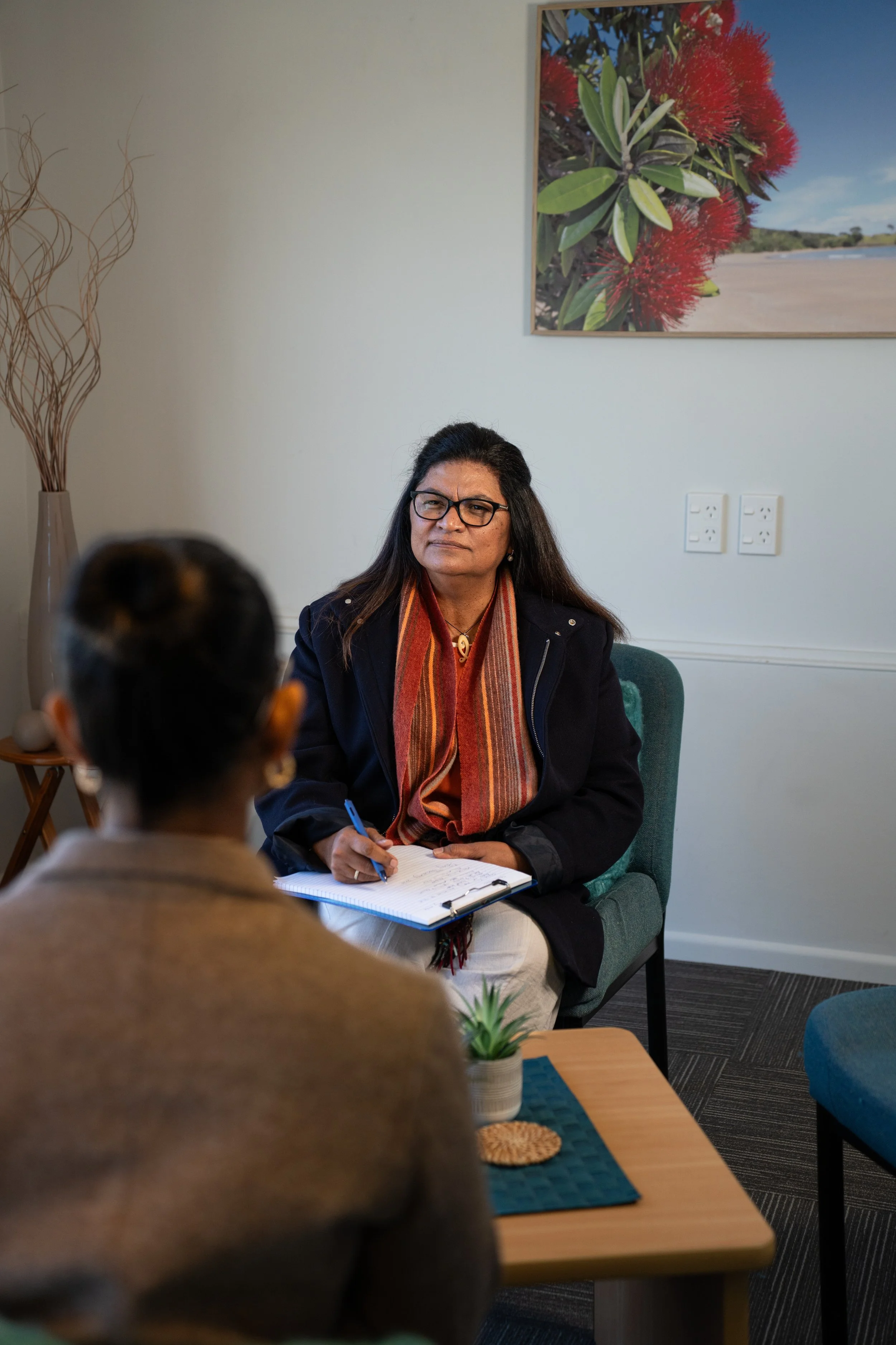Female counsellor listening attentively to a female client during a confidential counselling session at Pakuranga Counselling Centre, providing mental health and wellbeing support in Pakuranga, Auckland.