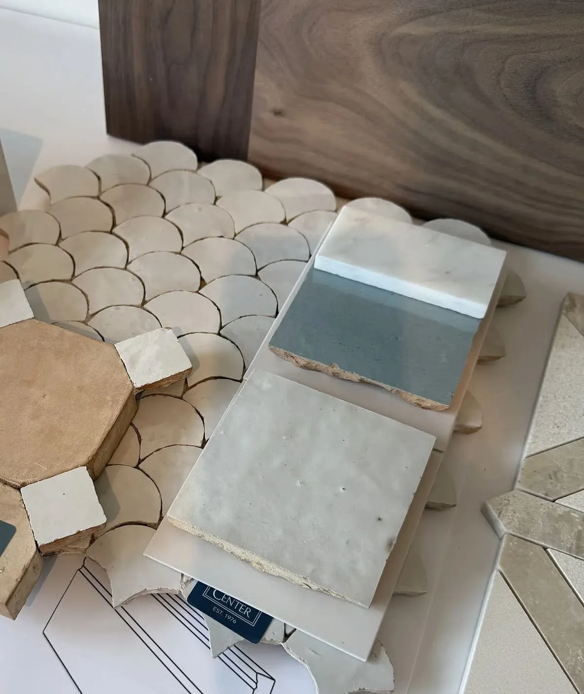 Stone and tile samples laid out for selection, Christopher Roy & Co. project in progress