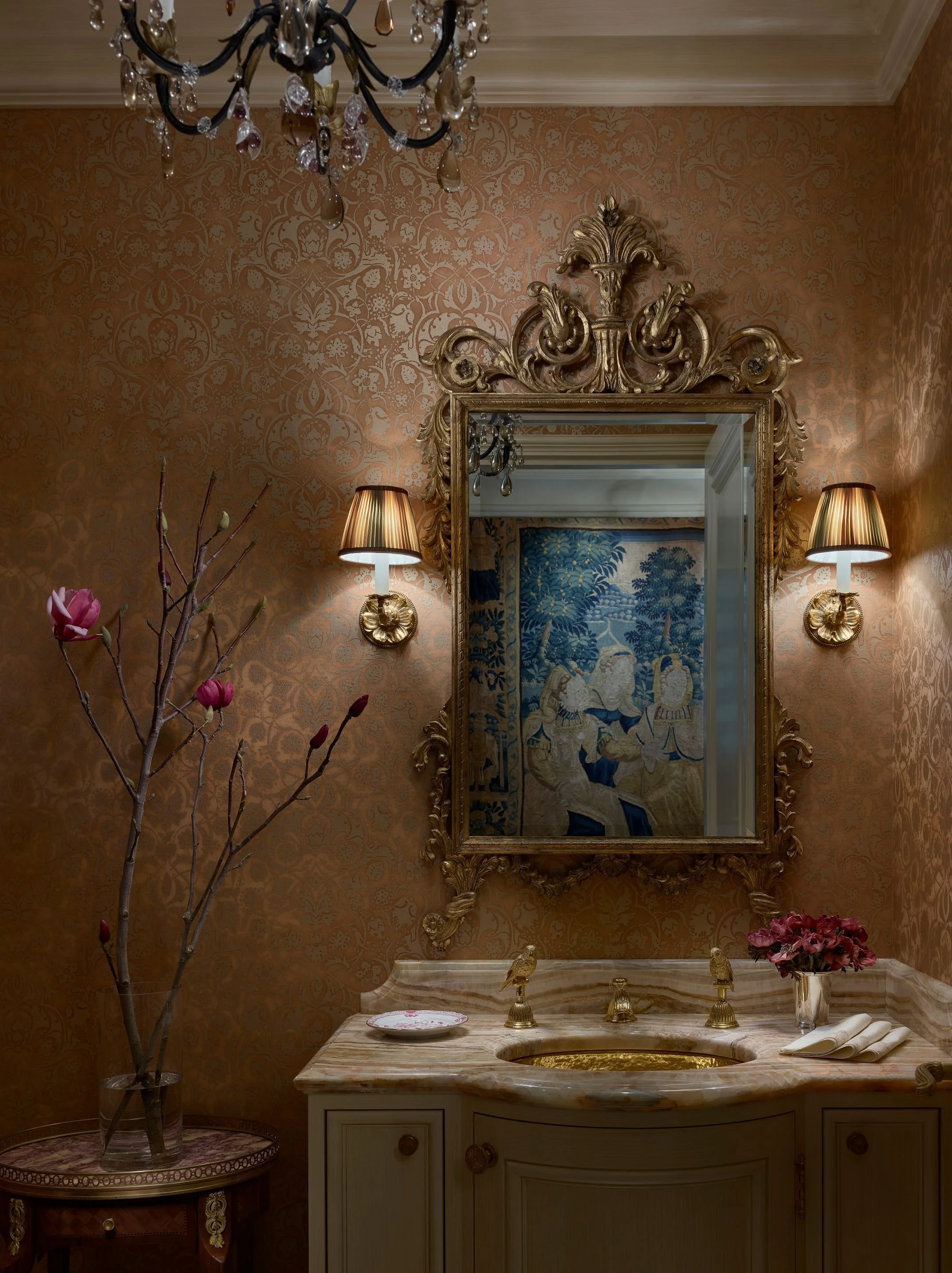Powder room with gilt mirror, sconces, and shimmering wallcovering, Classic French Apartment