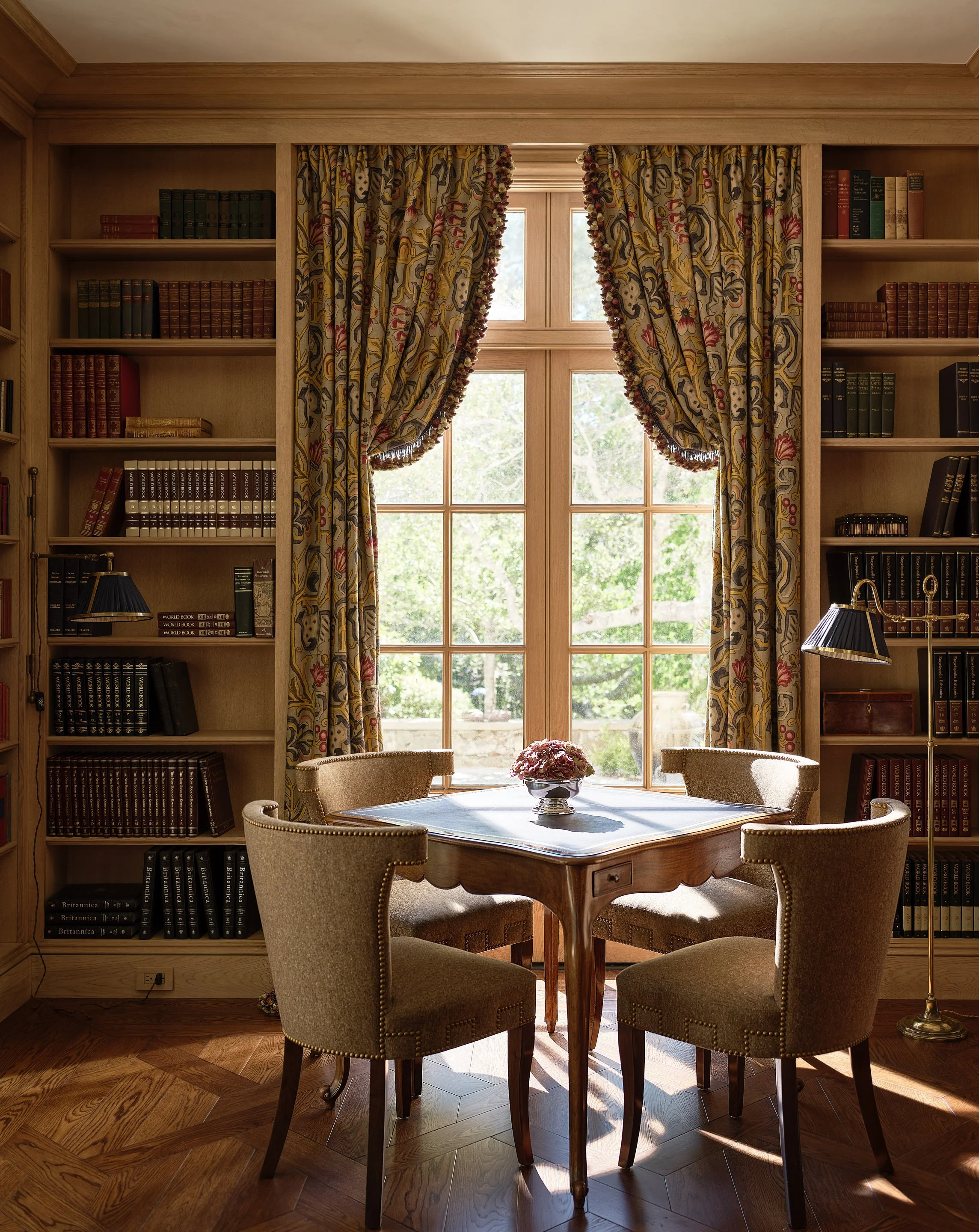 Library with game table, floral curtains, and built-in bookshelves, Hillsborough Estate