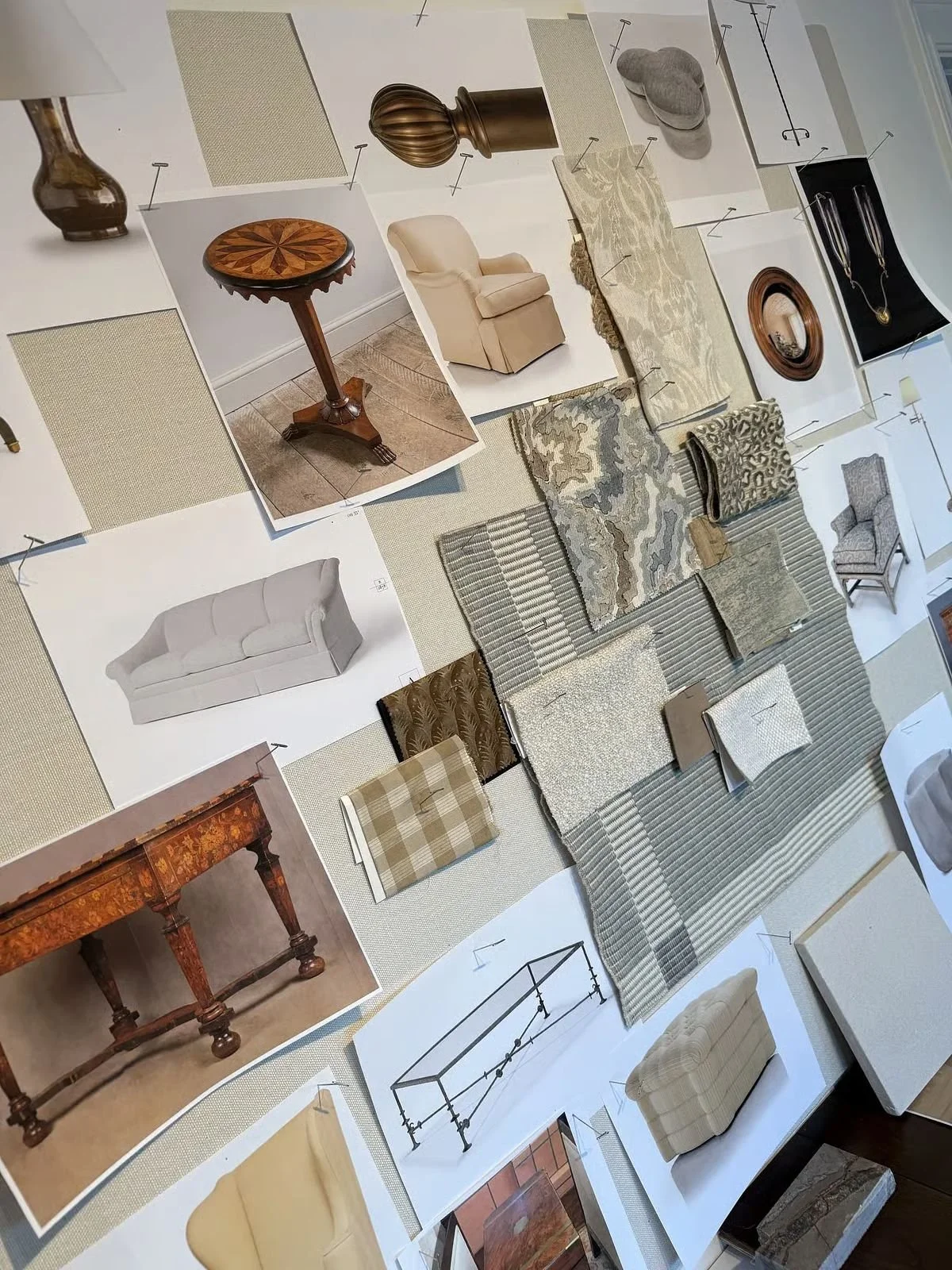 Fabric swatches arranged over floor plan drawings
